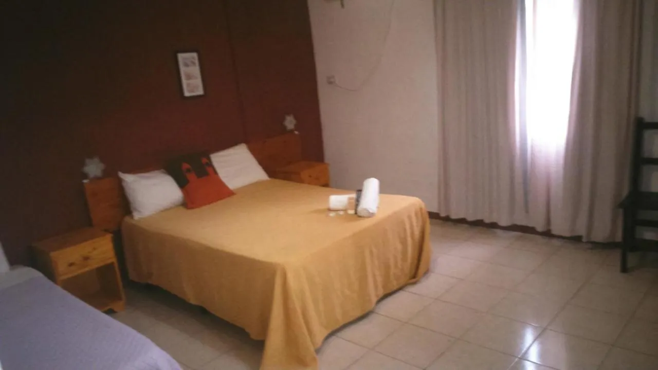 Bed in Petit Hotel Panambi