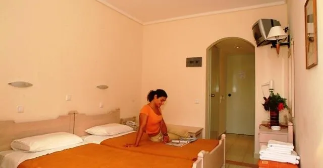 Bedroom in Theonia Hotel