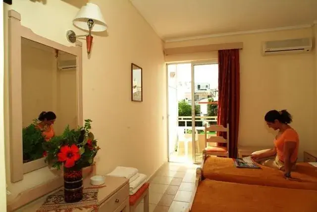 Bedroom in Theonia Hotel Bedroom in Theonia Hotel