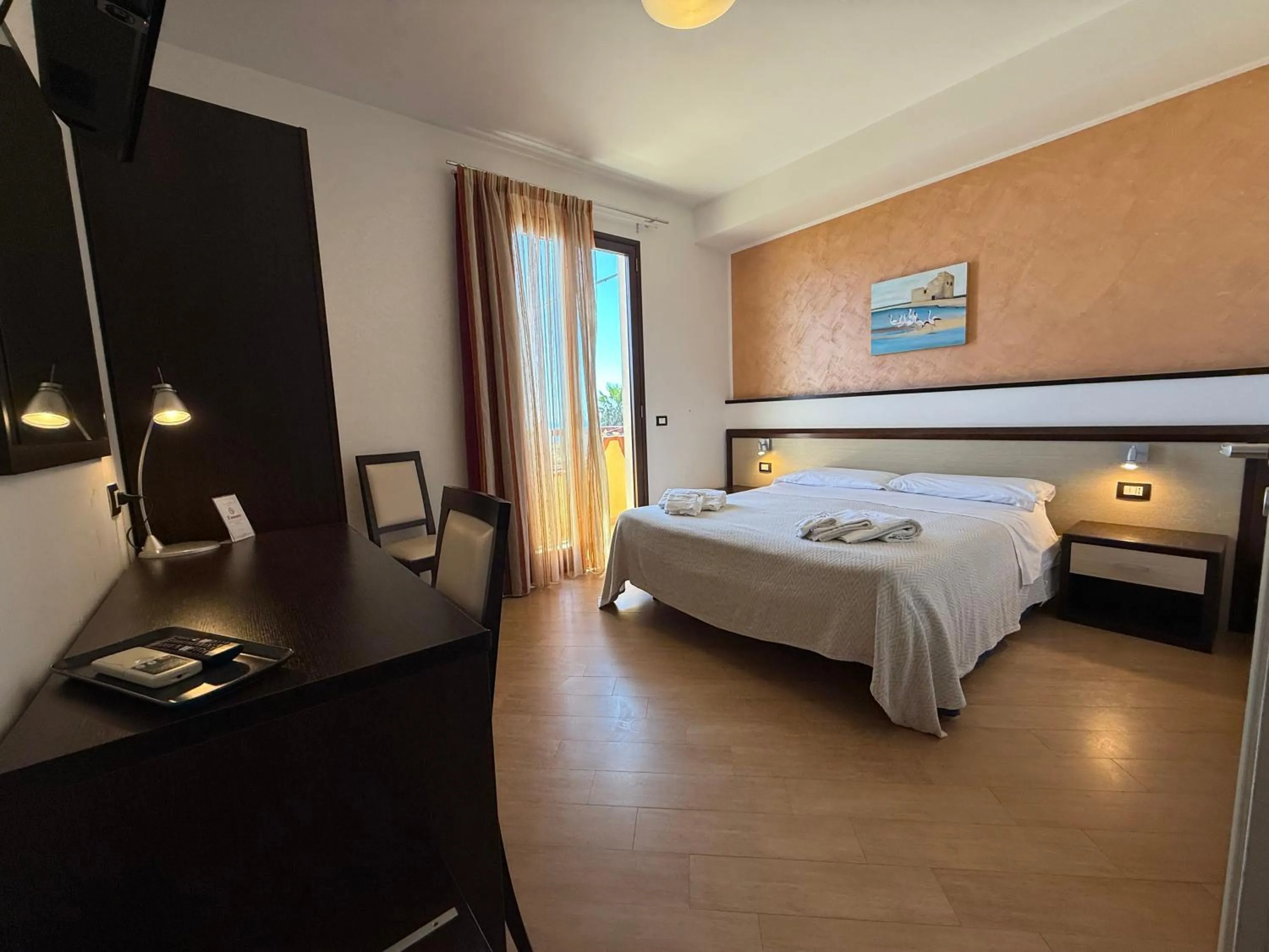 Bed in Albergo Perseo