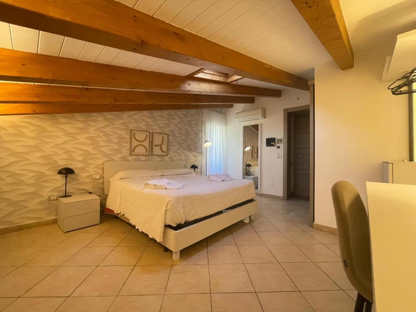 Bed in Albergo Perseo