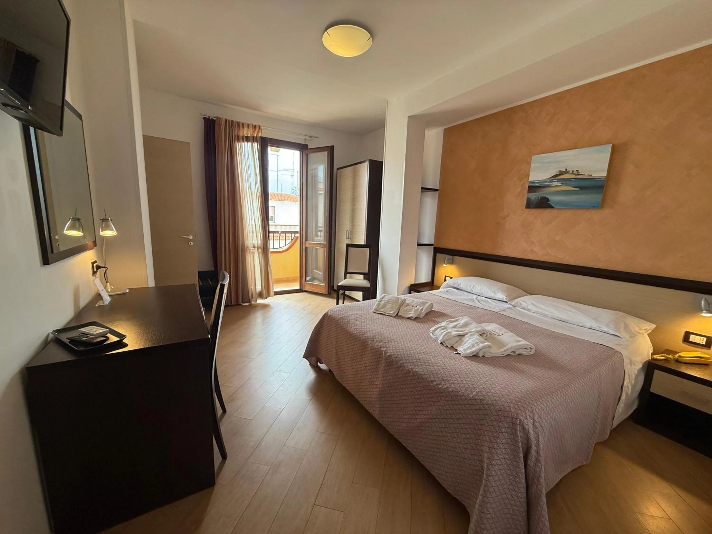 Bed in Albergo Perseo