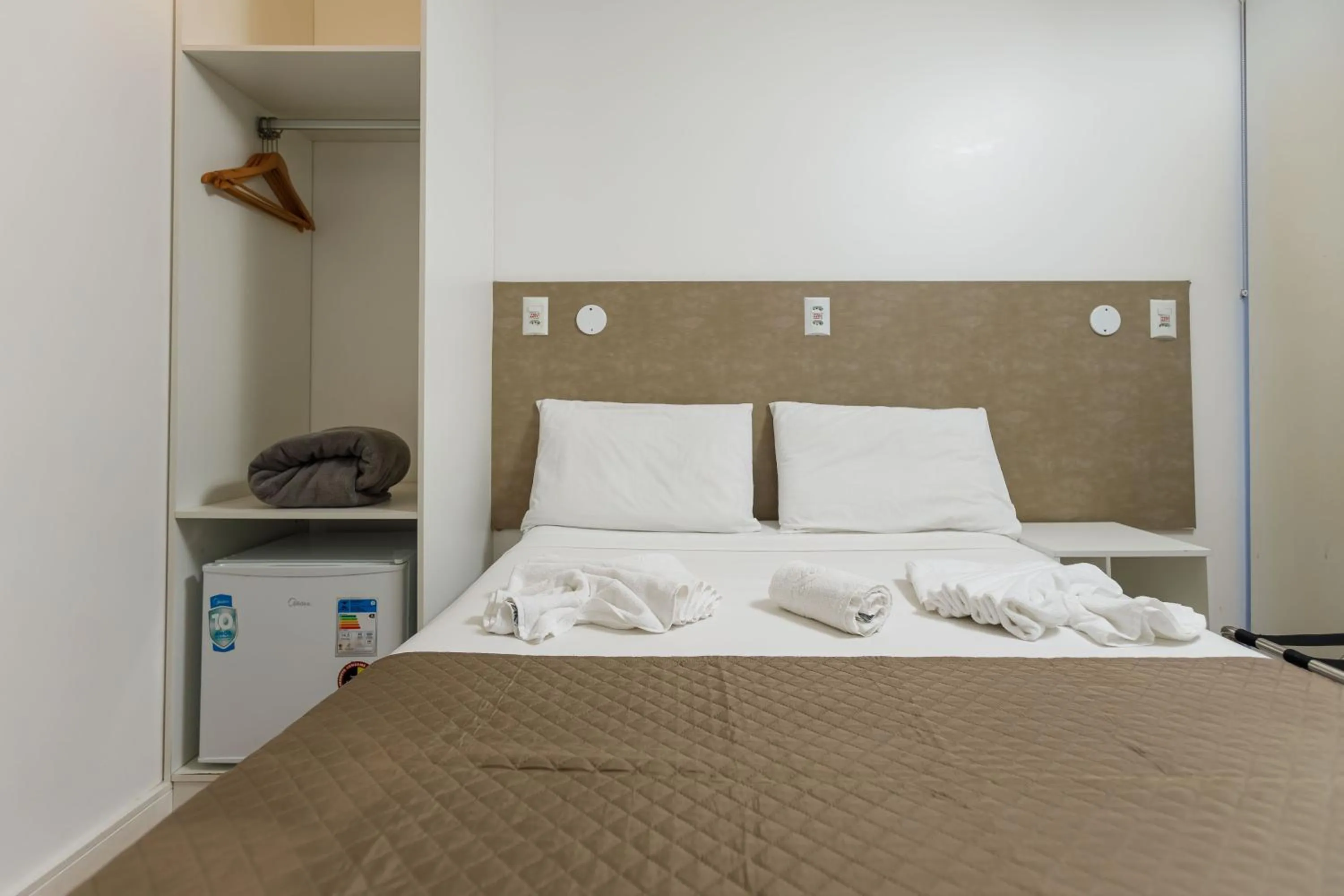 Photo of the whole room, Bed in Zuza Slim Suítes