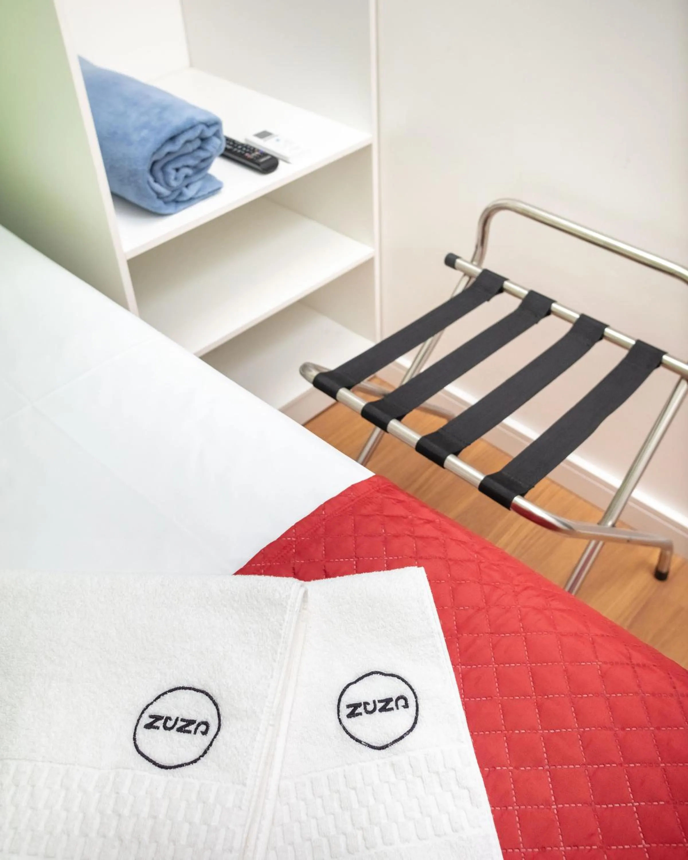 Bed in Zuza Slim Suítes