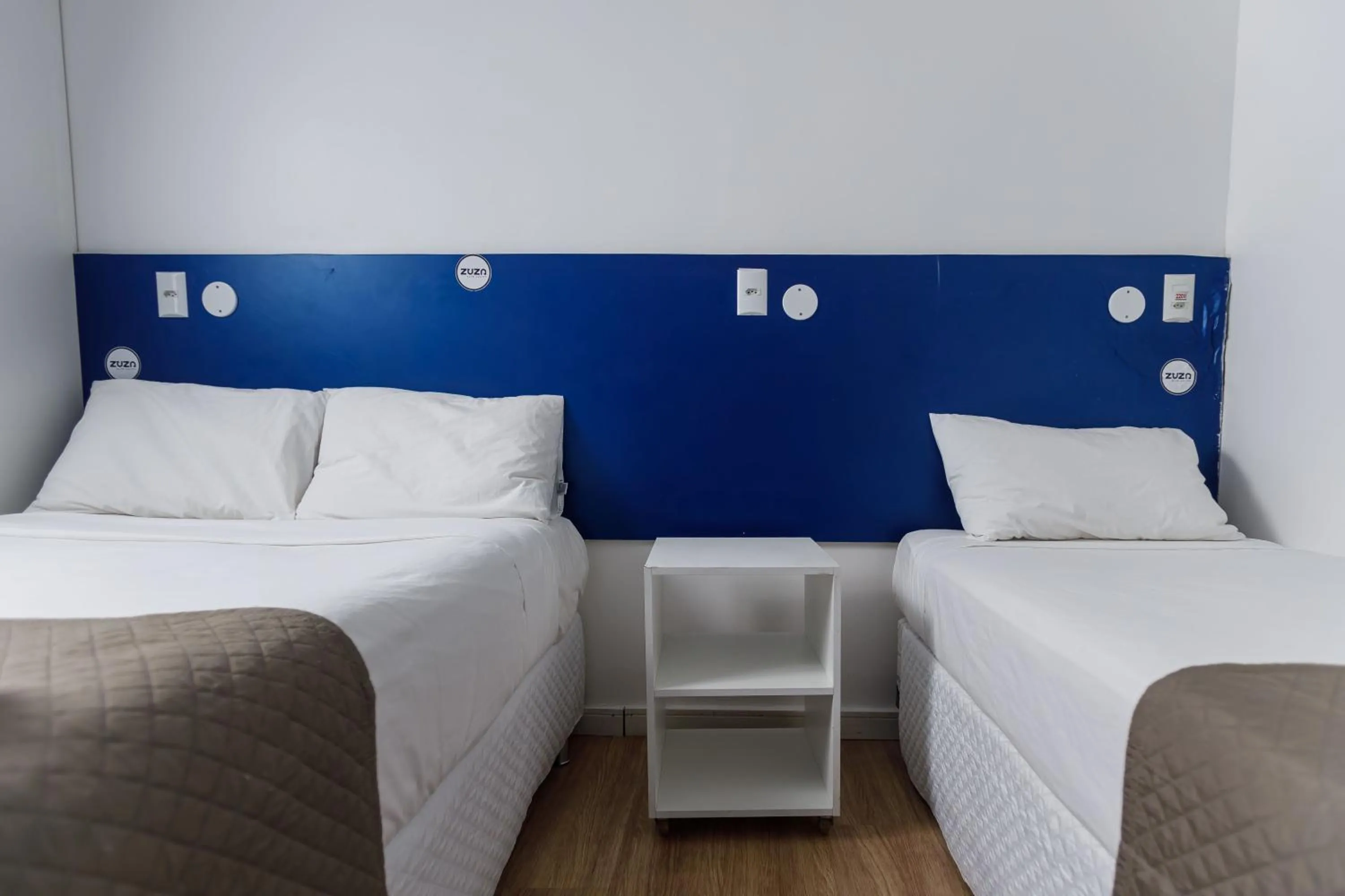 Bed in Zuza Slim Suítes