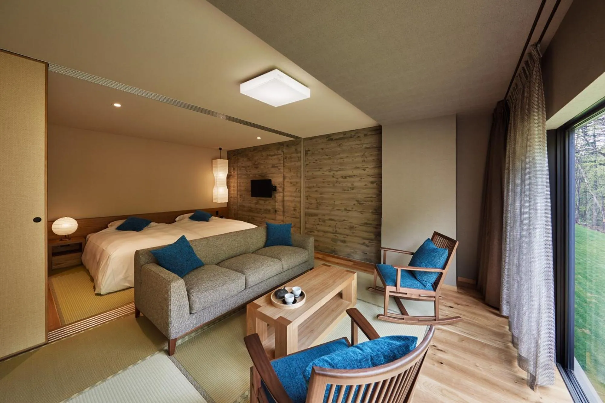 Living room, Bed in Okujozankei Onsen Kasho Gyoen