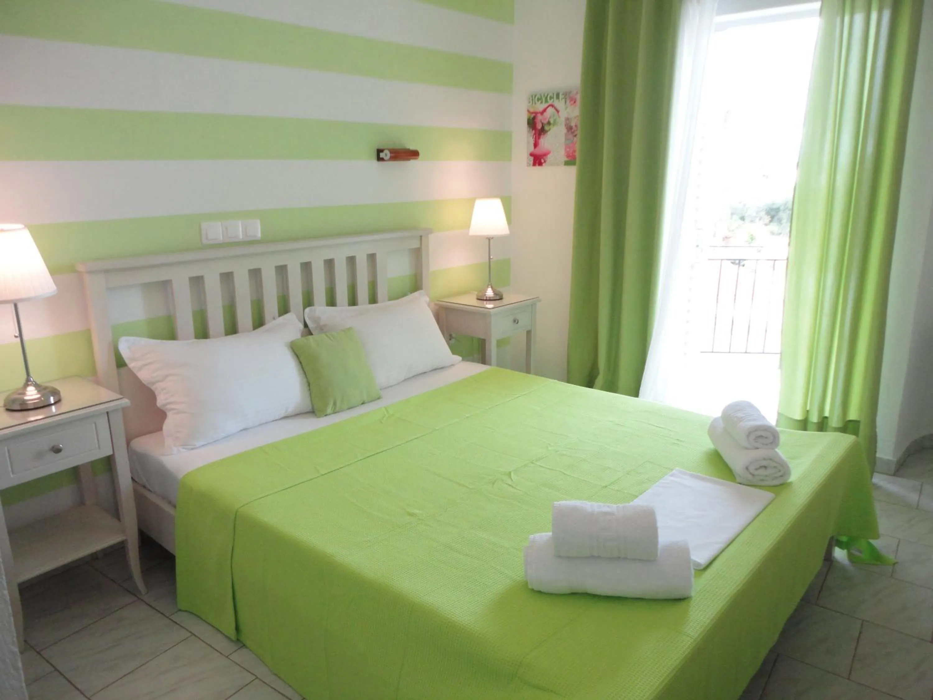 Bed in Mirto Beach Hotel & Restaurant