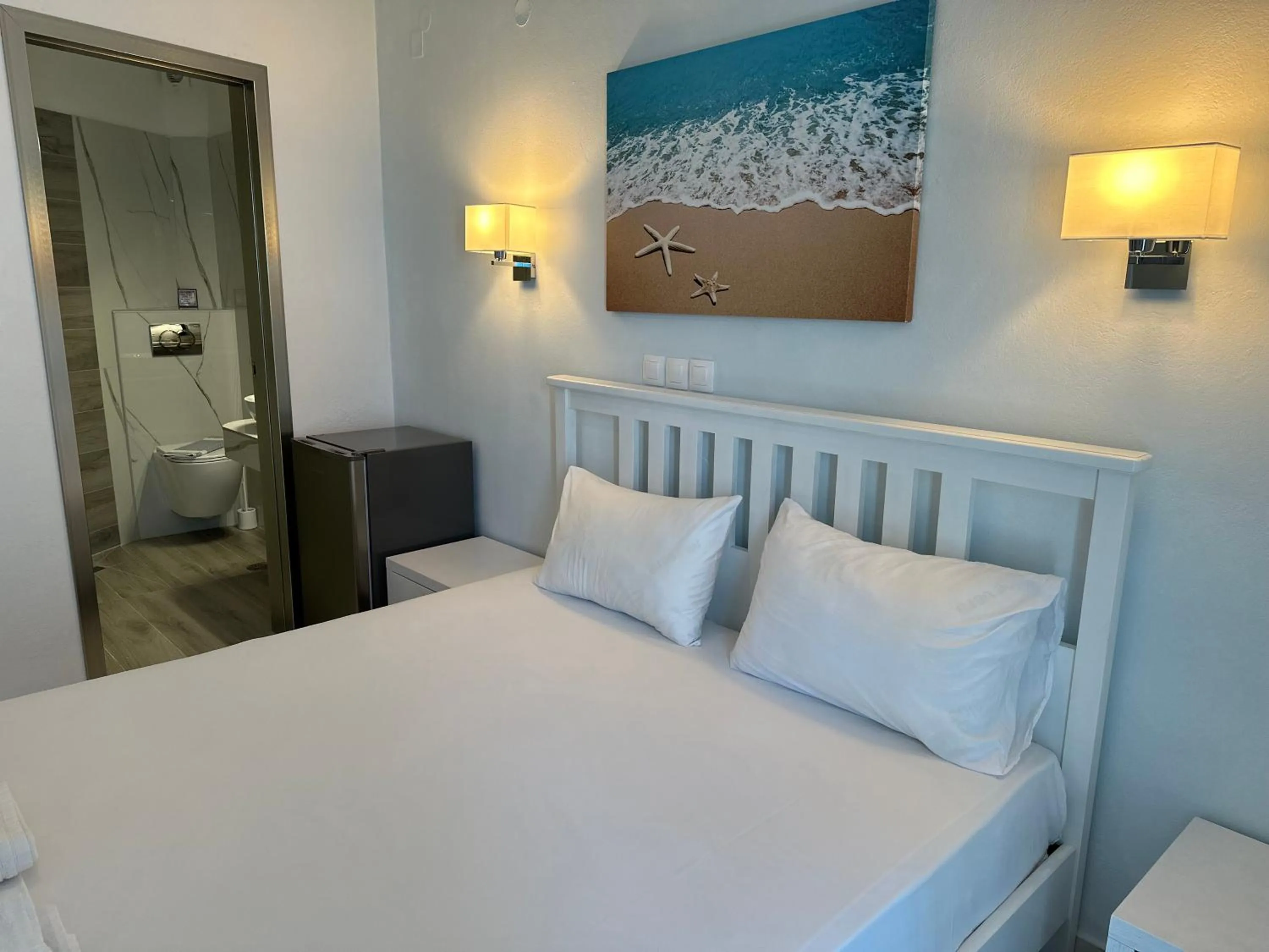 Bed in Mirto Beach Hotel & Restaurant