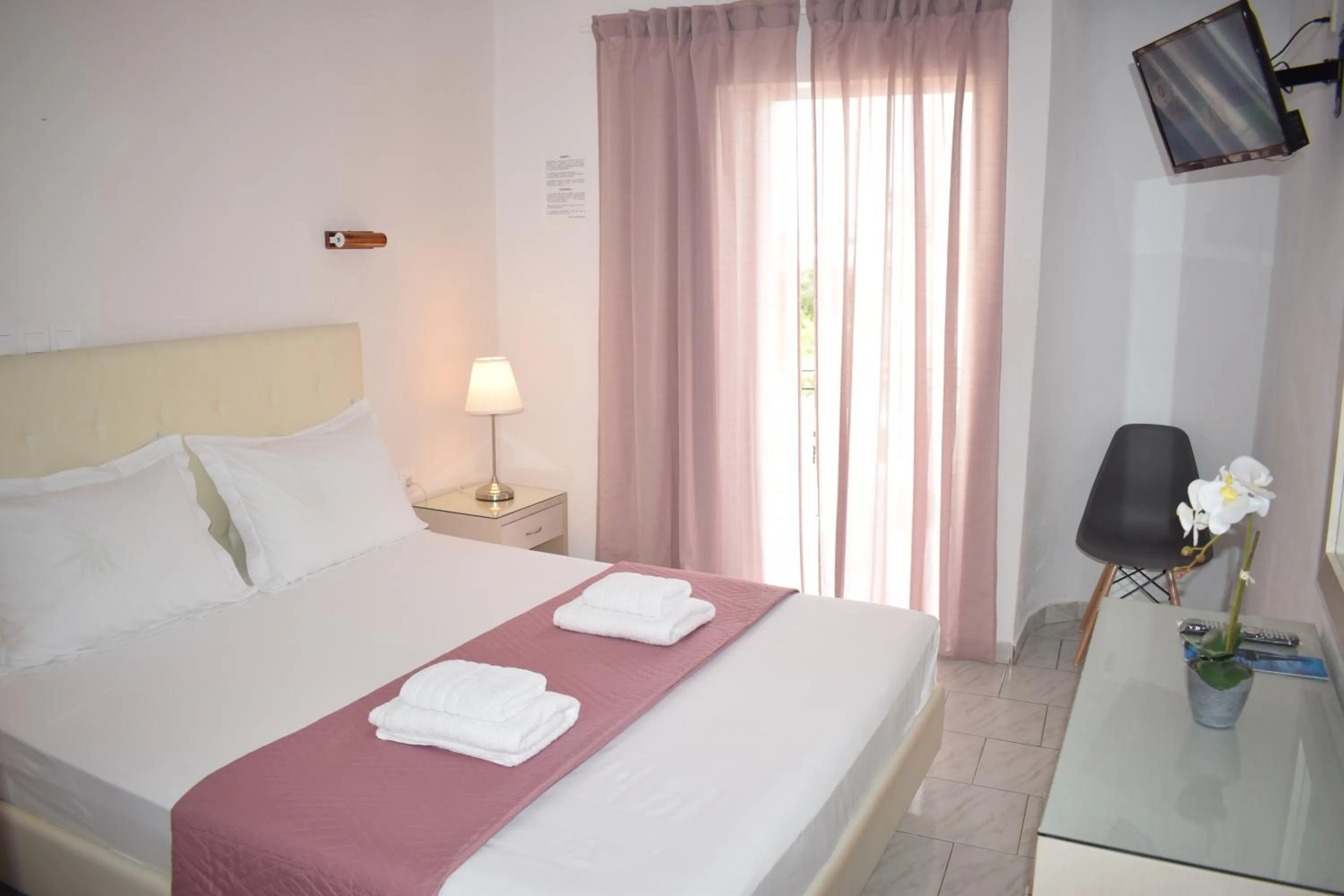 Bed in Mirto Beach Hotel & Restaurant