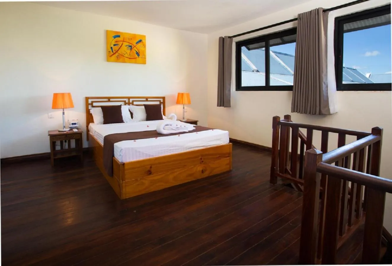 Bed in Le Palmiste Resort & Spa