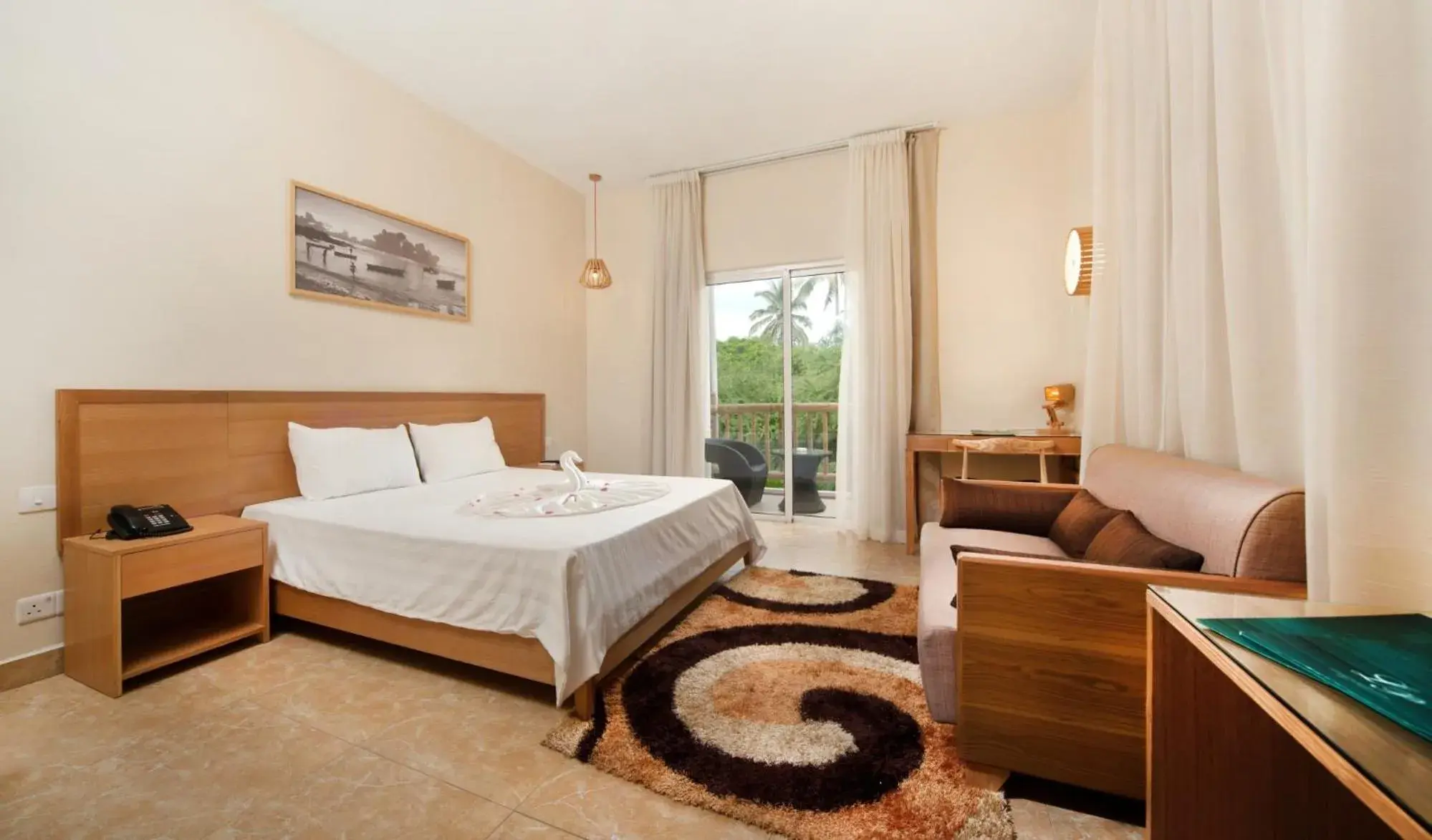 Photo of the whole room, Bed in Le Palmiste Resort & Spa Photo of the whole room, Bed in Le Palmiste Resort & Spa