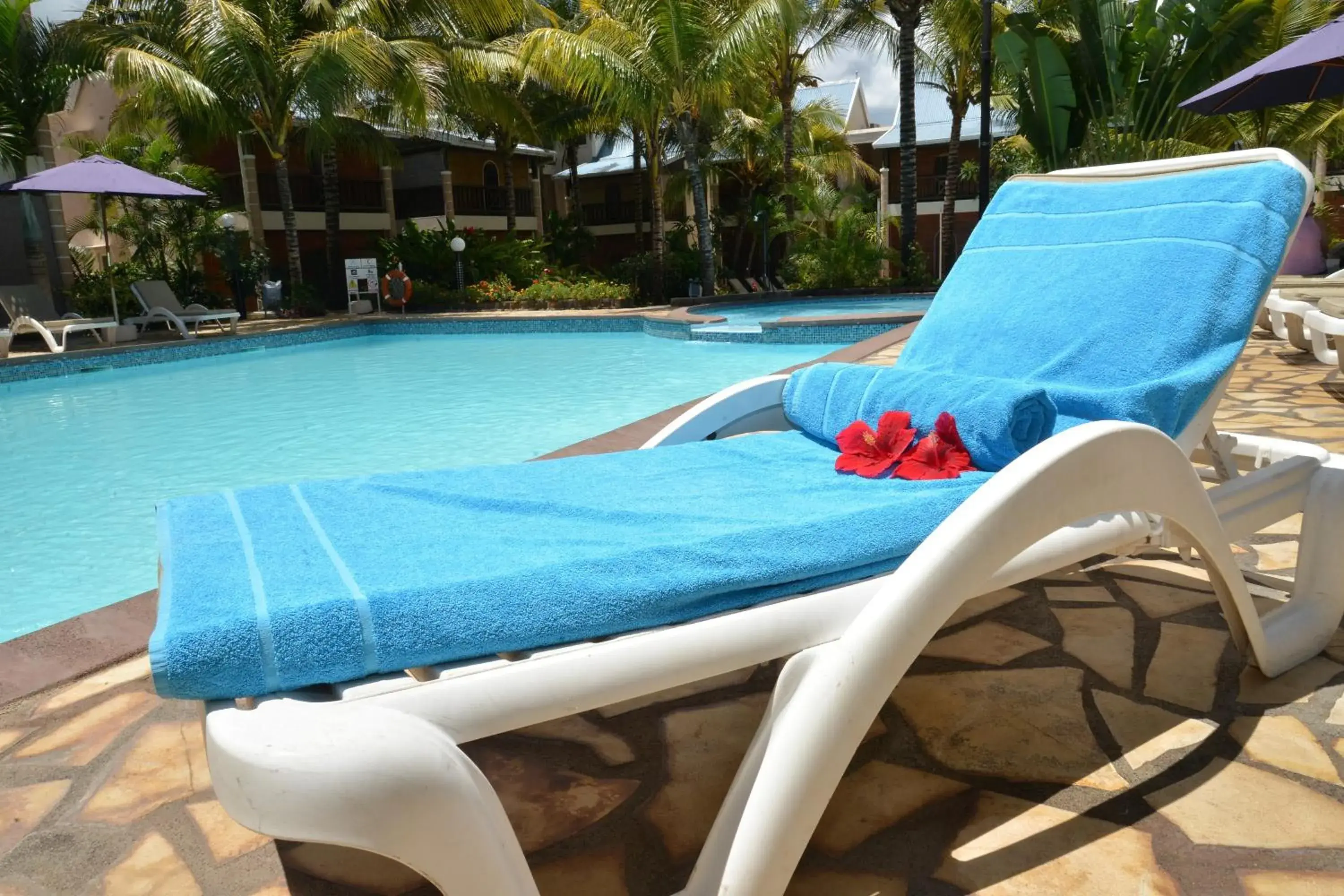 Pool view in Le Palmiste Resort & Spa Pool view in Le Palmiste Resort & Spa