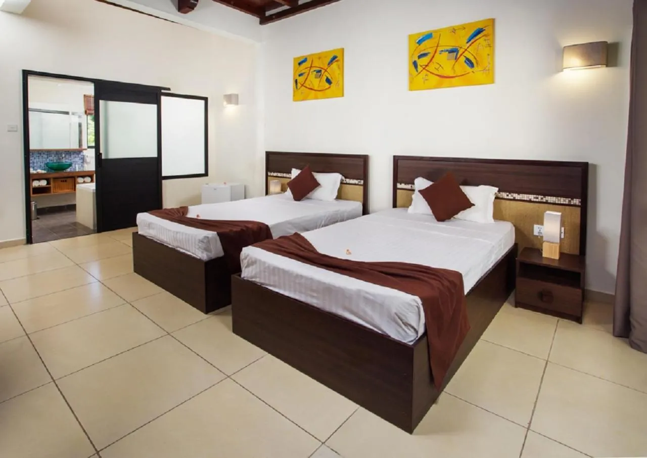 Photo of the whole room, Bed in Le Palmiste Resort & Spa