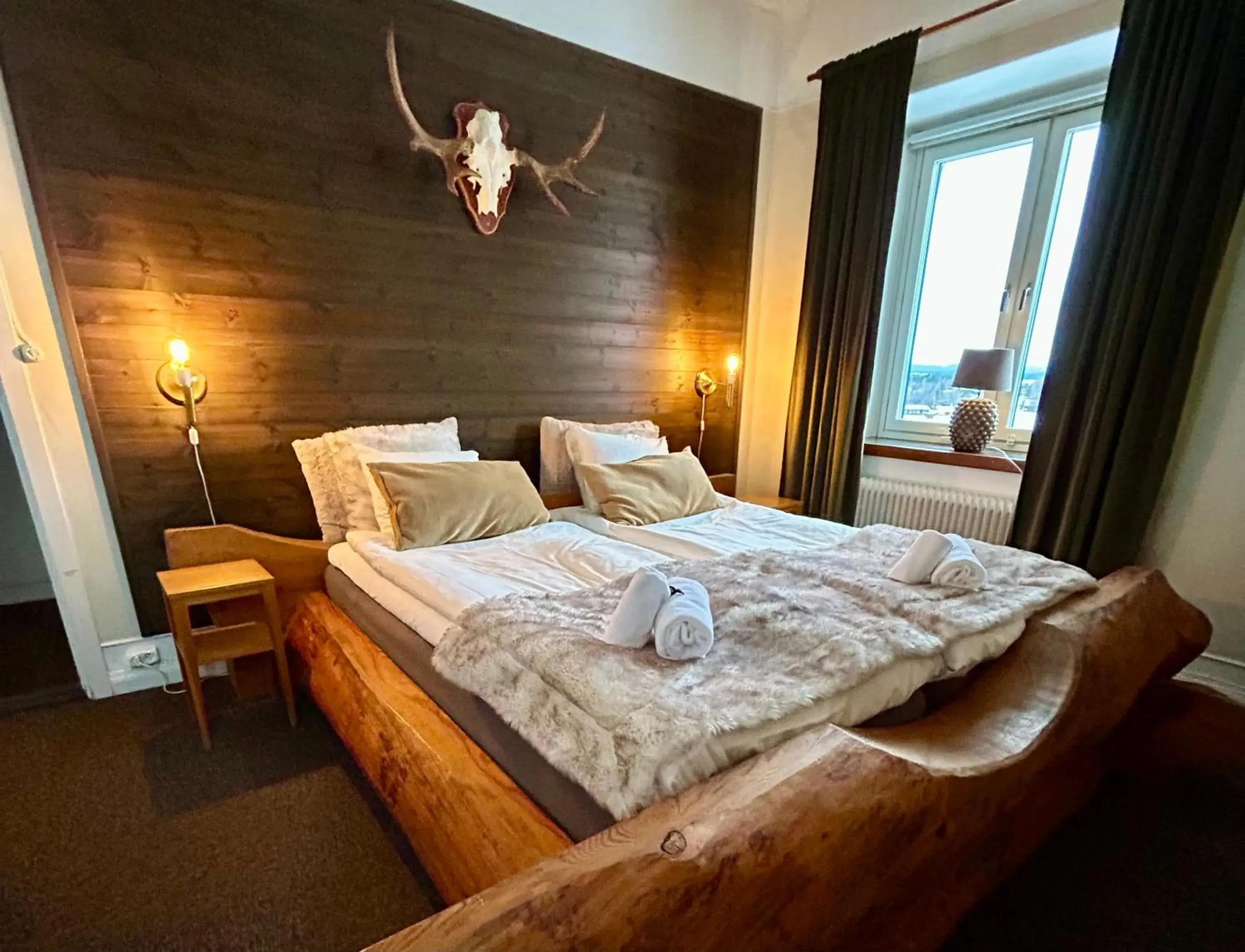 Quadruple Room with Lake View in Kungshaga Hotell Quadruple Room with Lake View in Kungshaga Hotell