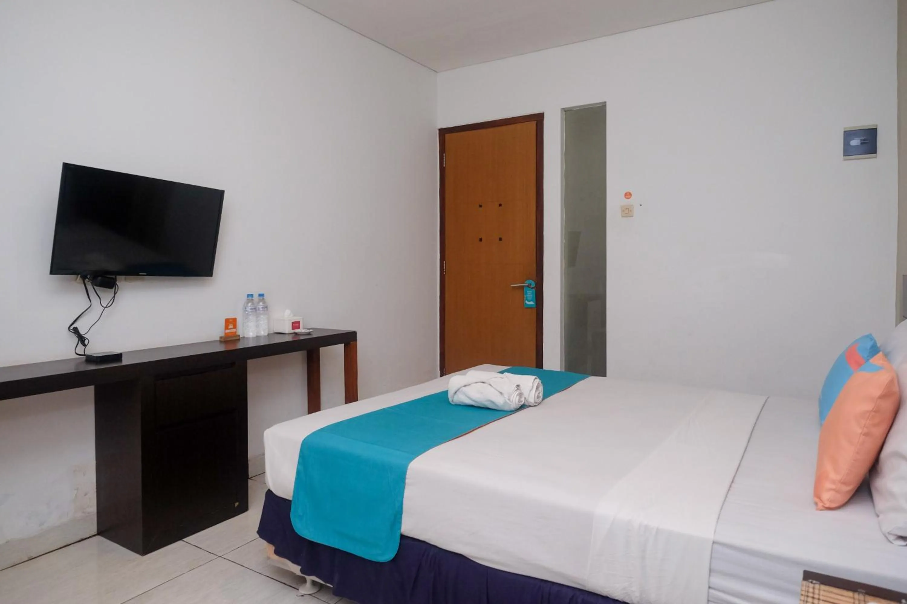 Bedroom, Bed in Sans Hotel Prime Cailendra Yogyakarta by RedDoorz