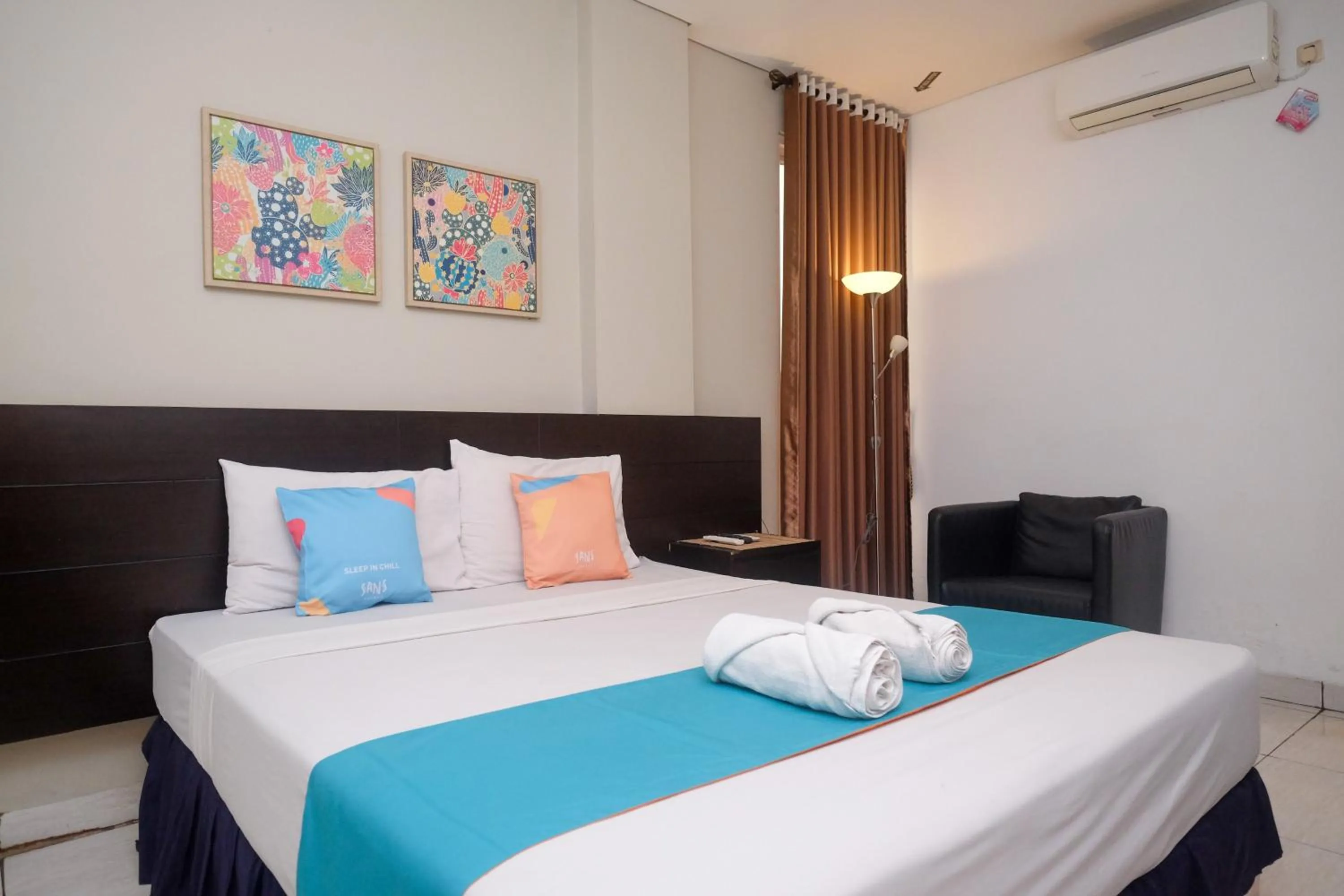 Bedroom, Bed in Sans Hotel Prime Cailendra Yogyakarta by RedDoorz