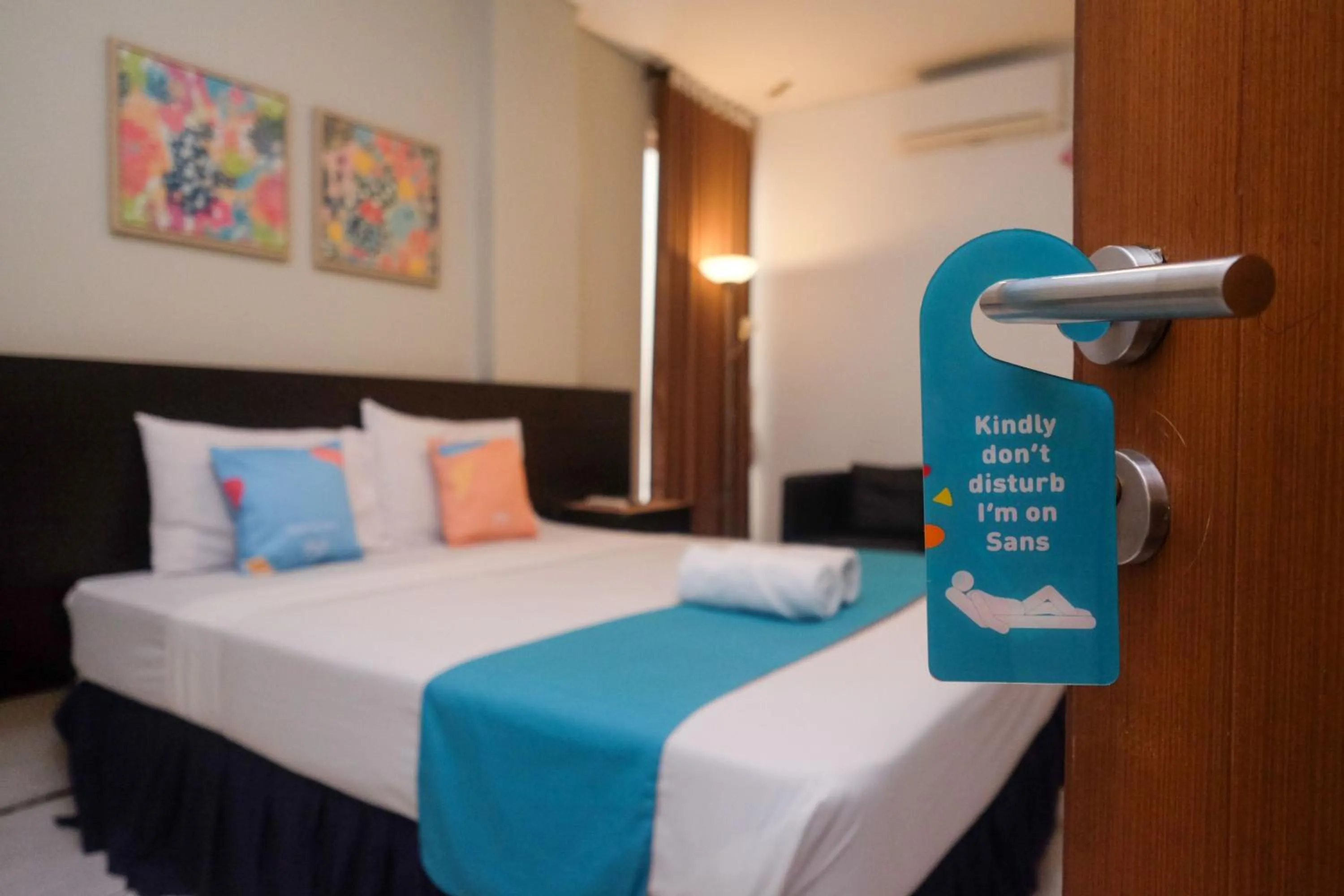 Bedroom, Bed in Sans Hotel Prime Cailendra Yogyakarta by RedDoorz