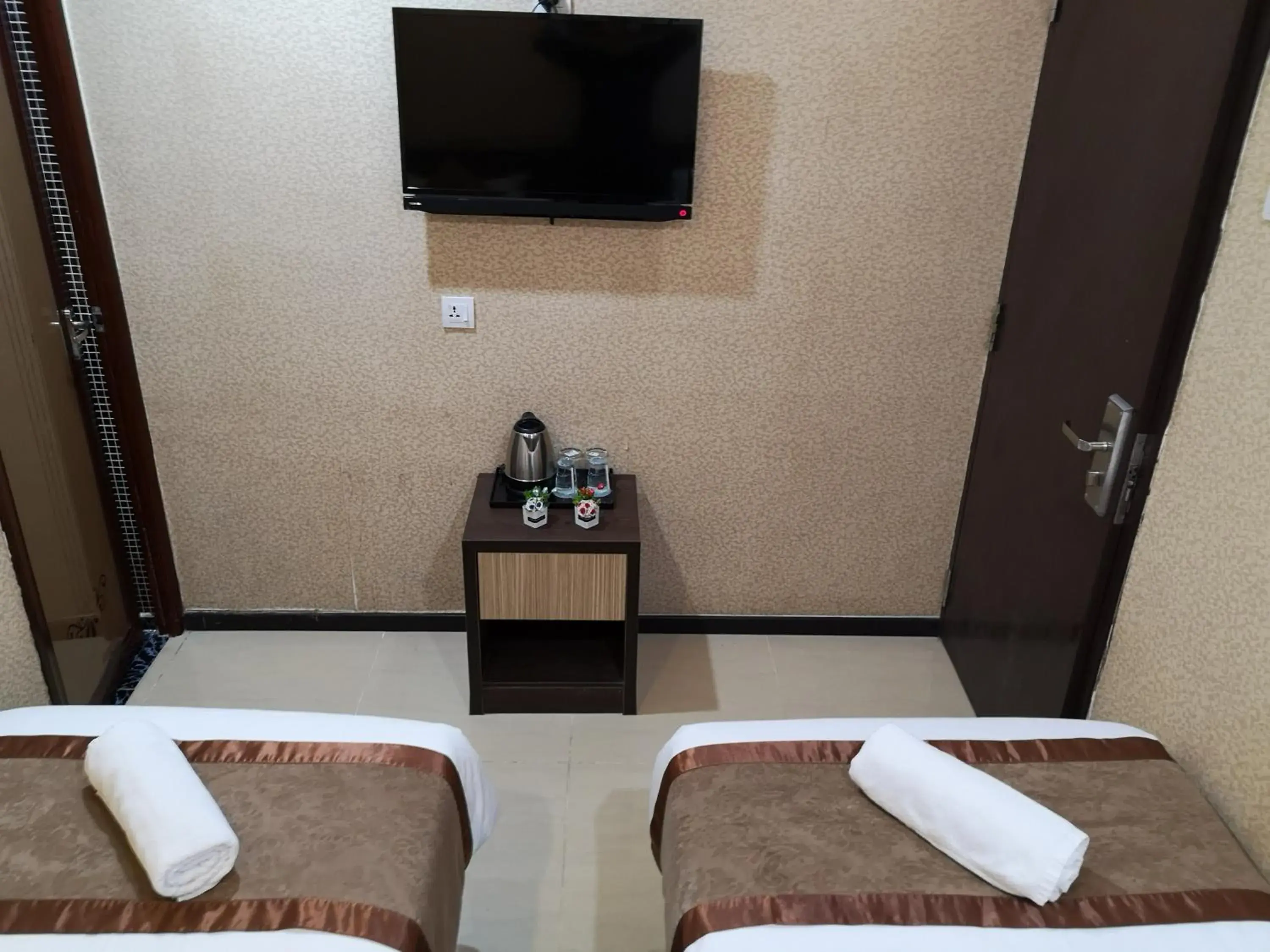 Bed, TV/Entertainment Center in Hotel Grand Palace Ampang