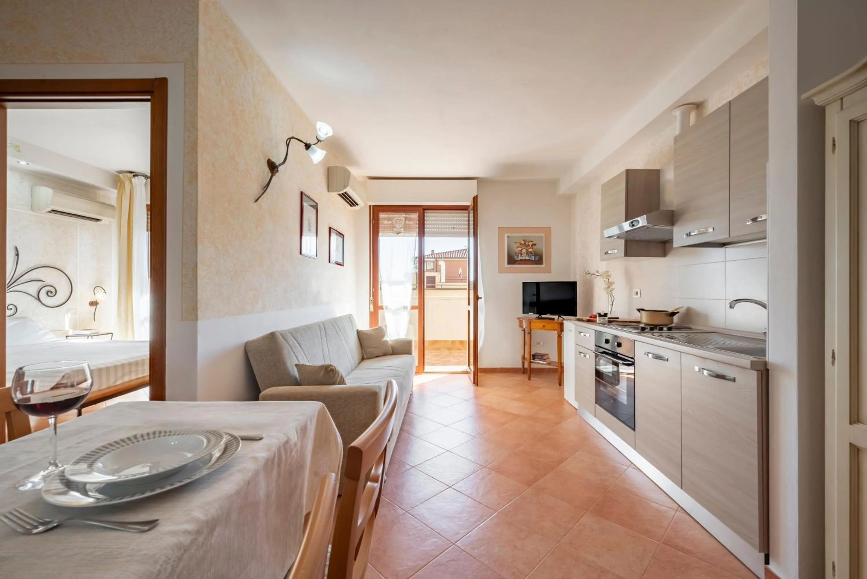 Kitchen or kitchenette in Lola Piccolo Hotel e Appartamenti