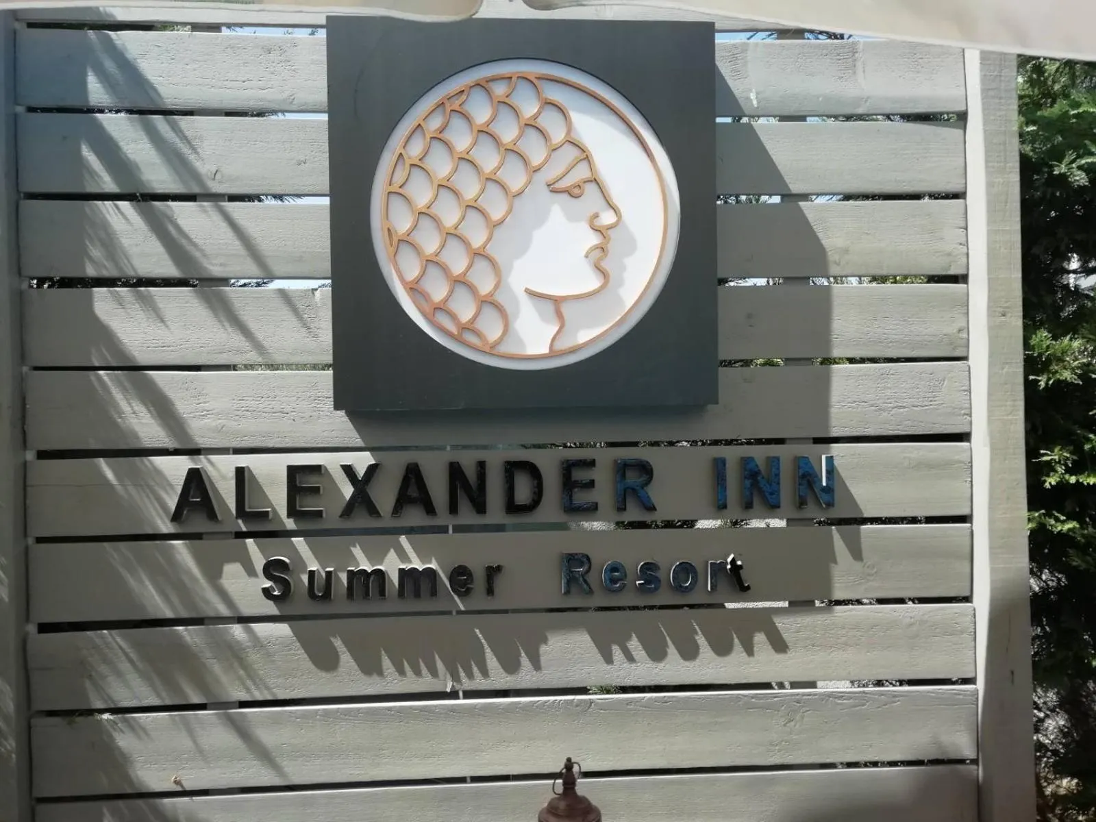 Property logo or sign in Alexander Inn