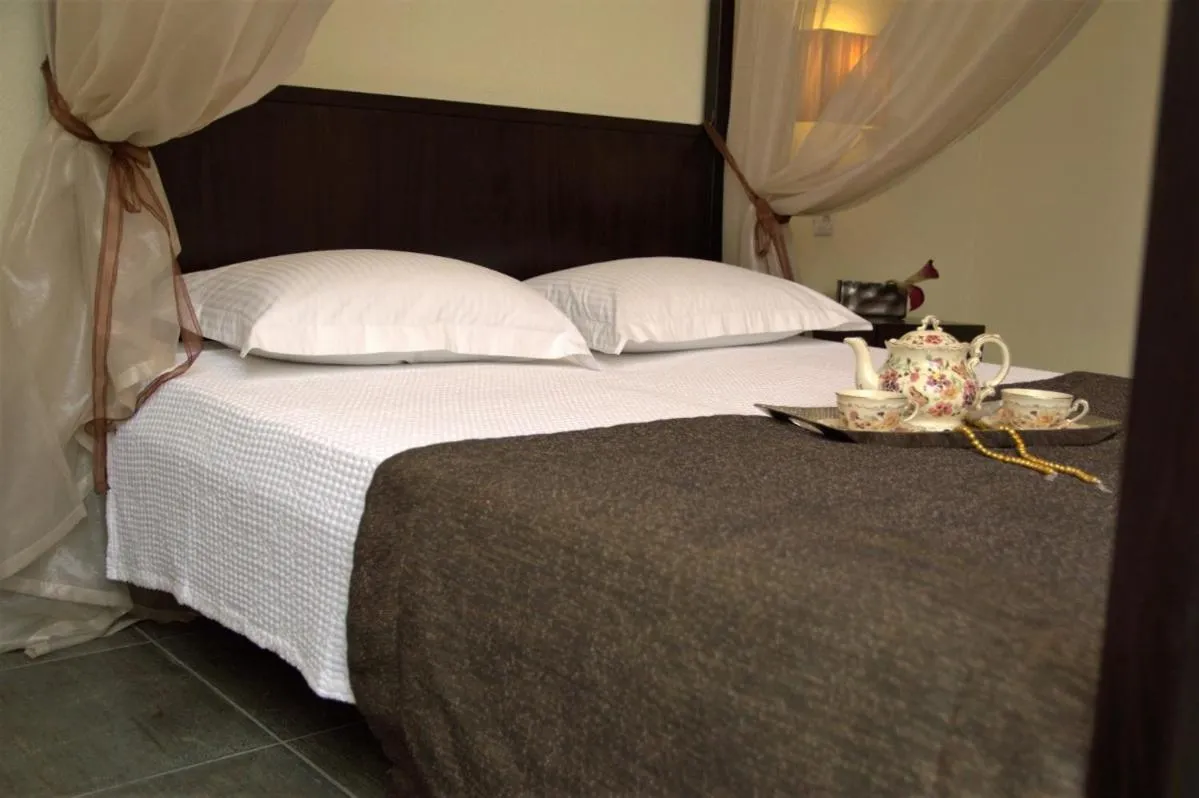 Bed in Alexander Inn