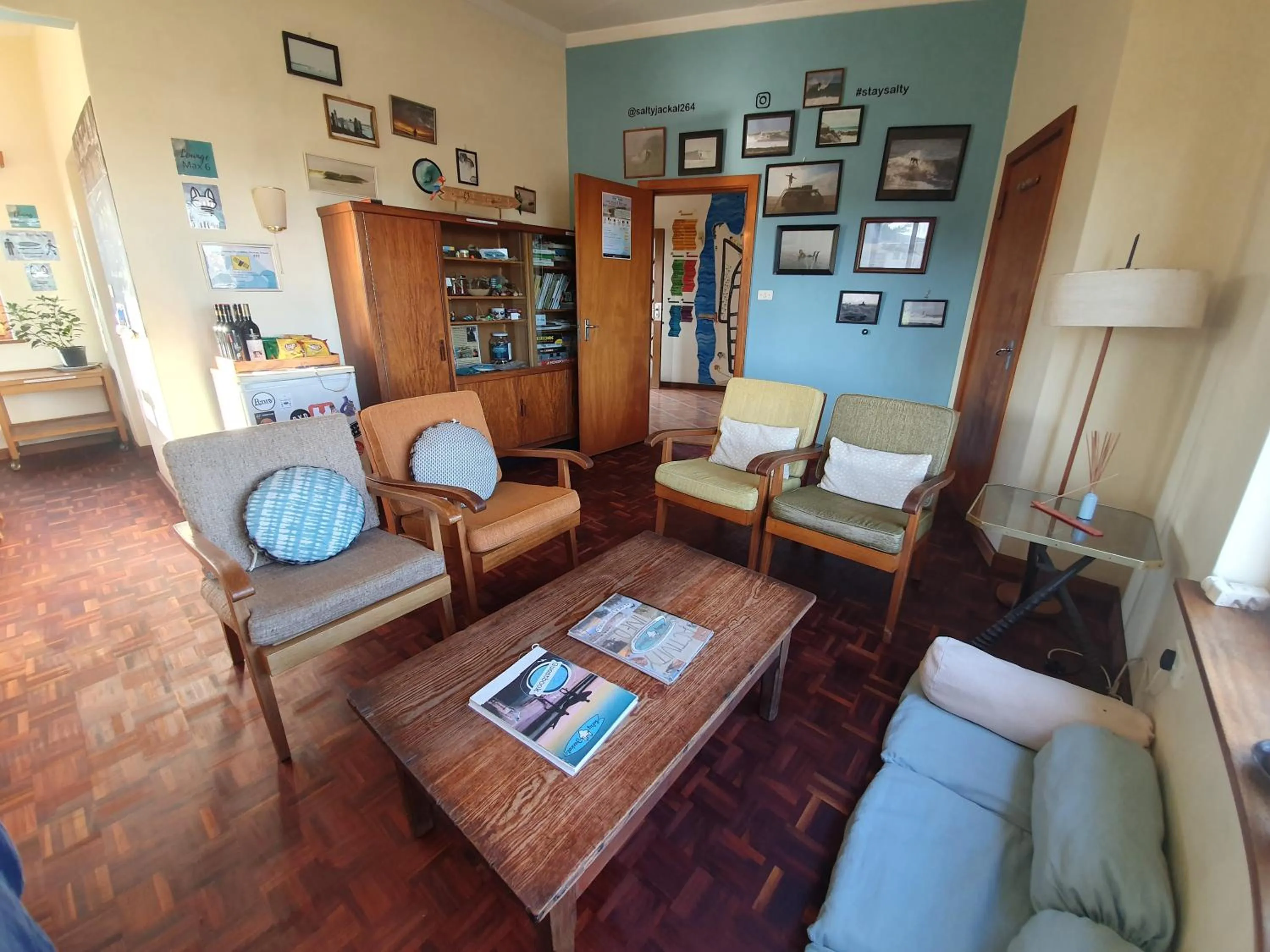 Communal lounge/ TV room in Salty Jackal Surf Camp