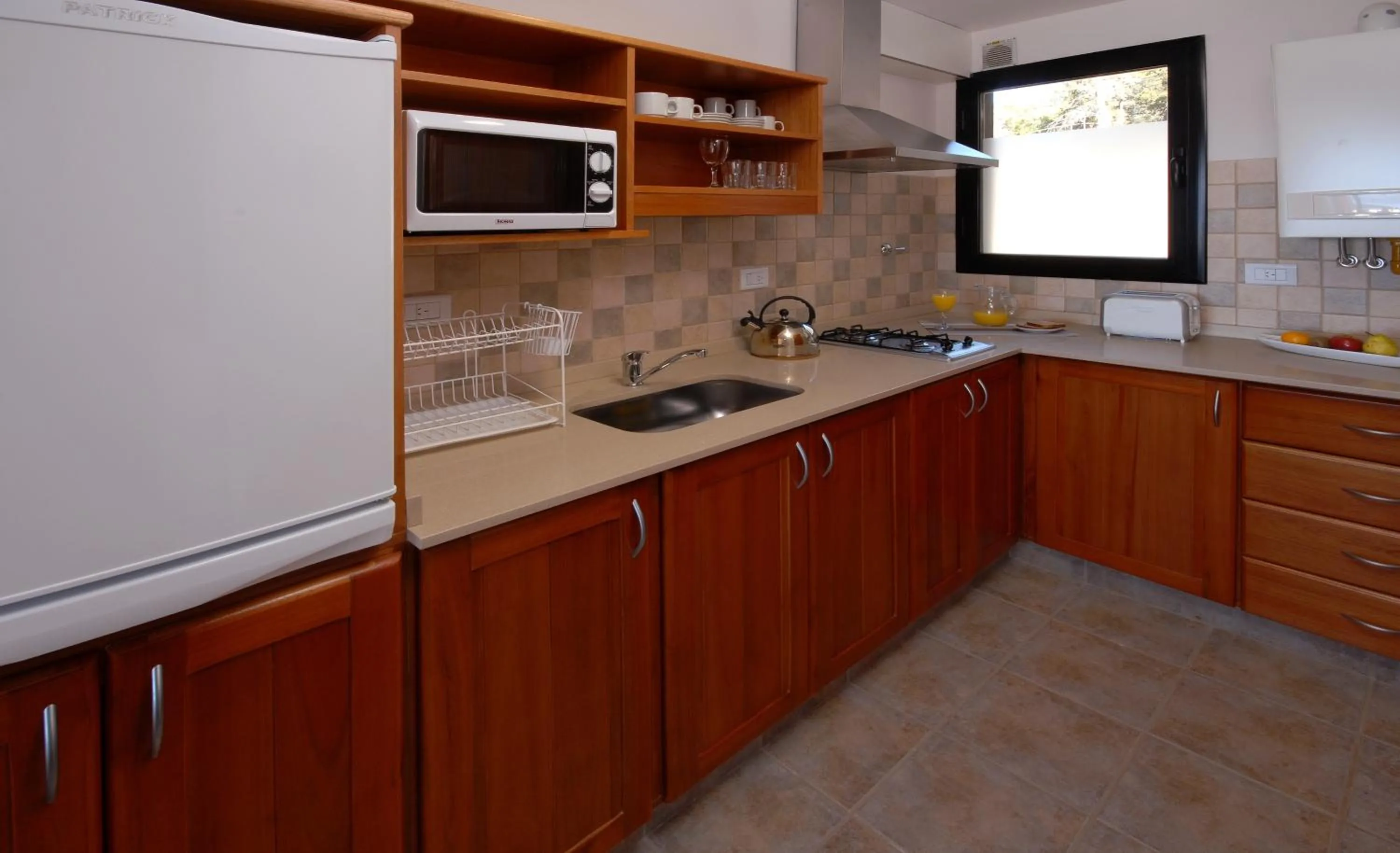 Kitchen or kitchenette in Catalonia Sur Aparts-Spa