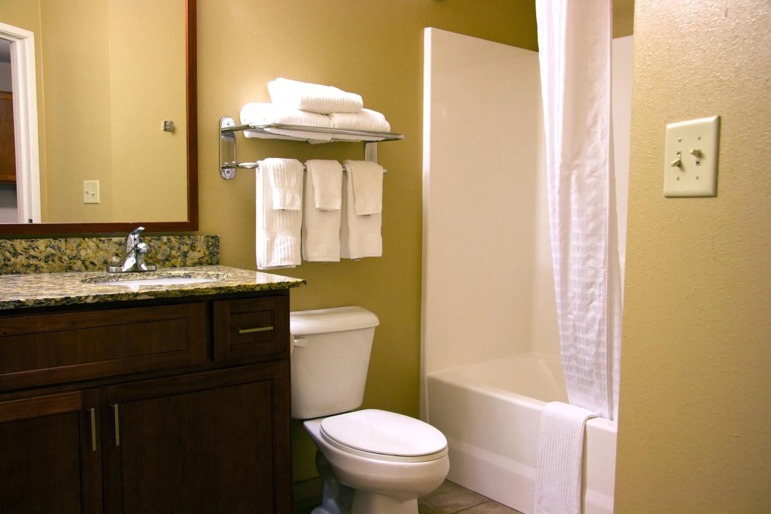 Bathroom in Candlewood Suites Champaign-Urbana University Area by IHG