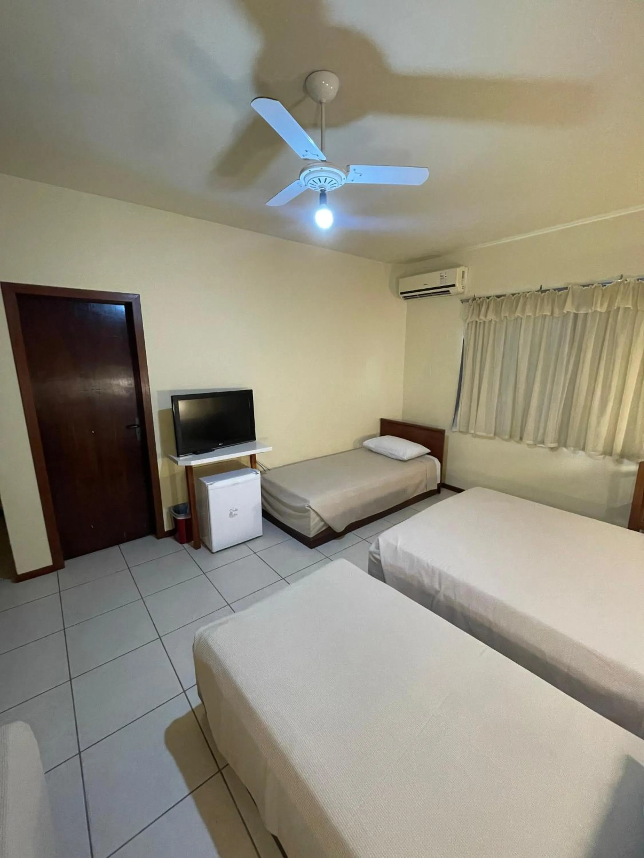 Bed in Hotel Cambirela