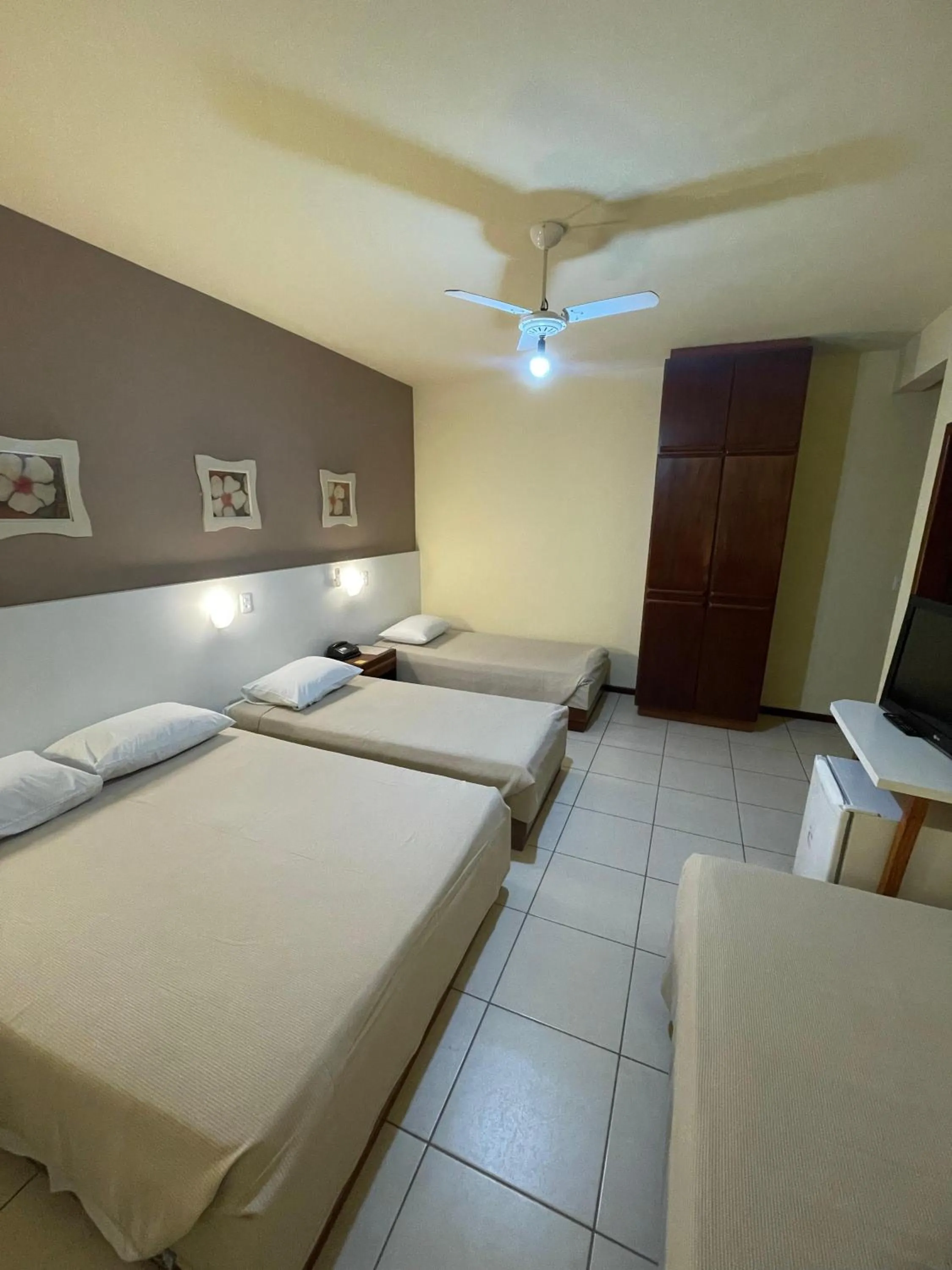 Bed in Hotel Cambirela