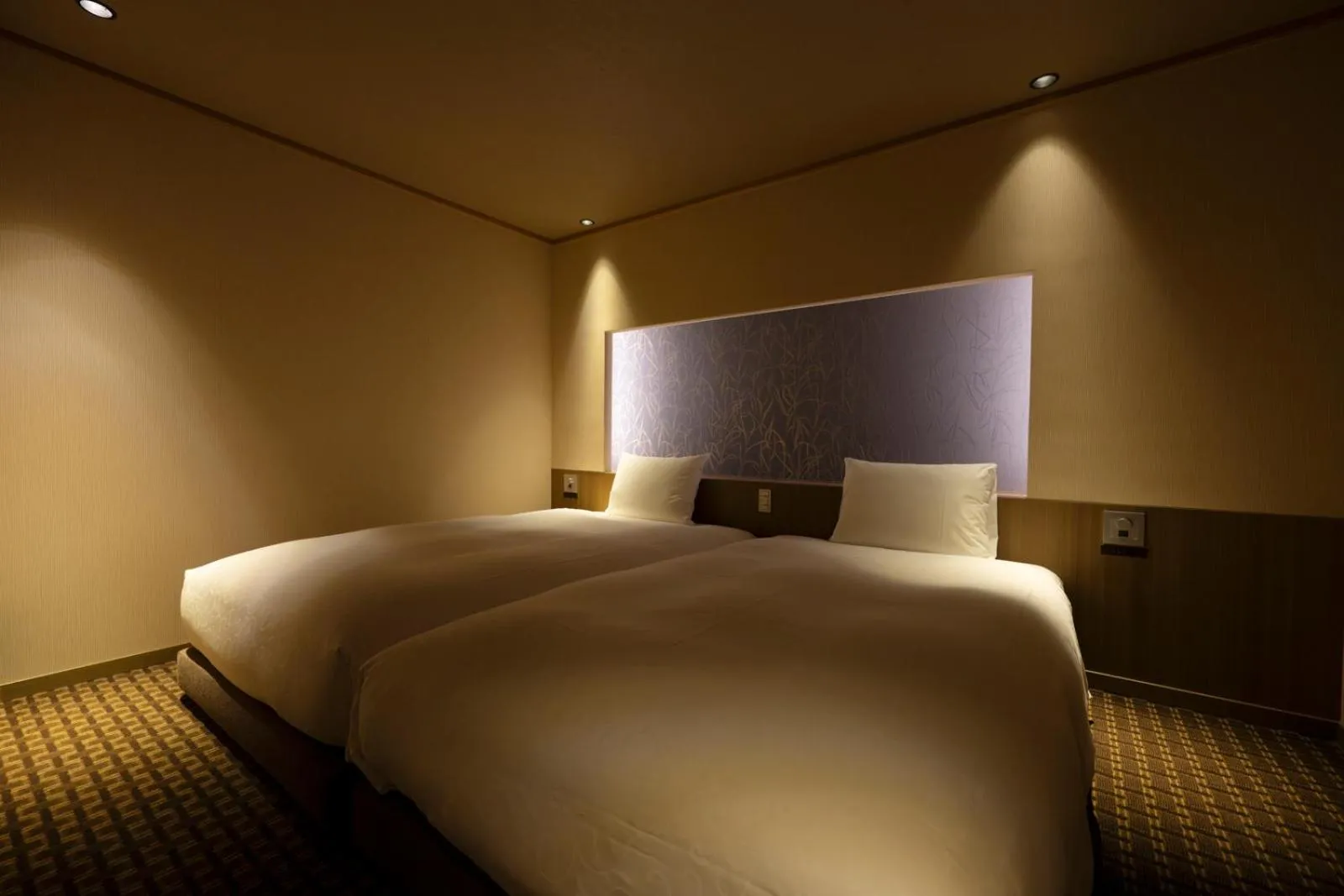 Bed in Laforet Shuzenji Sanshisuimei