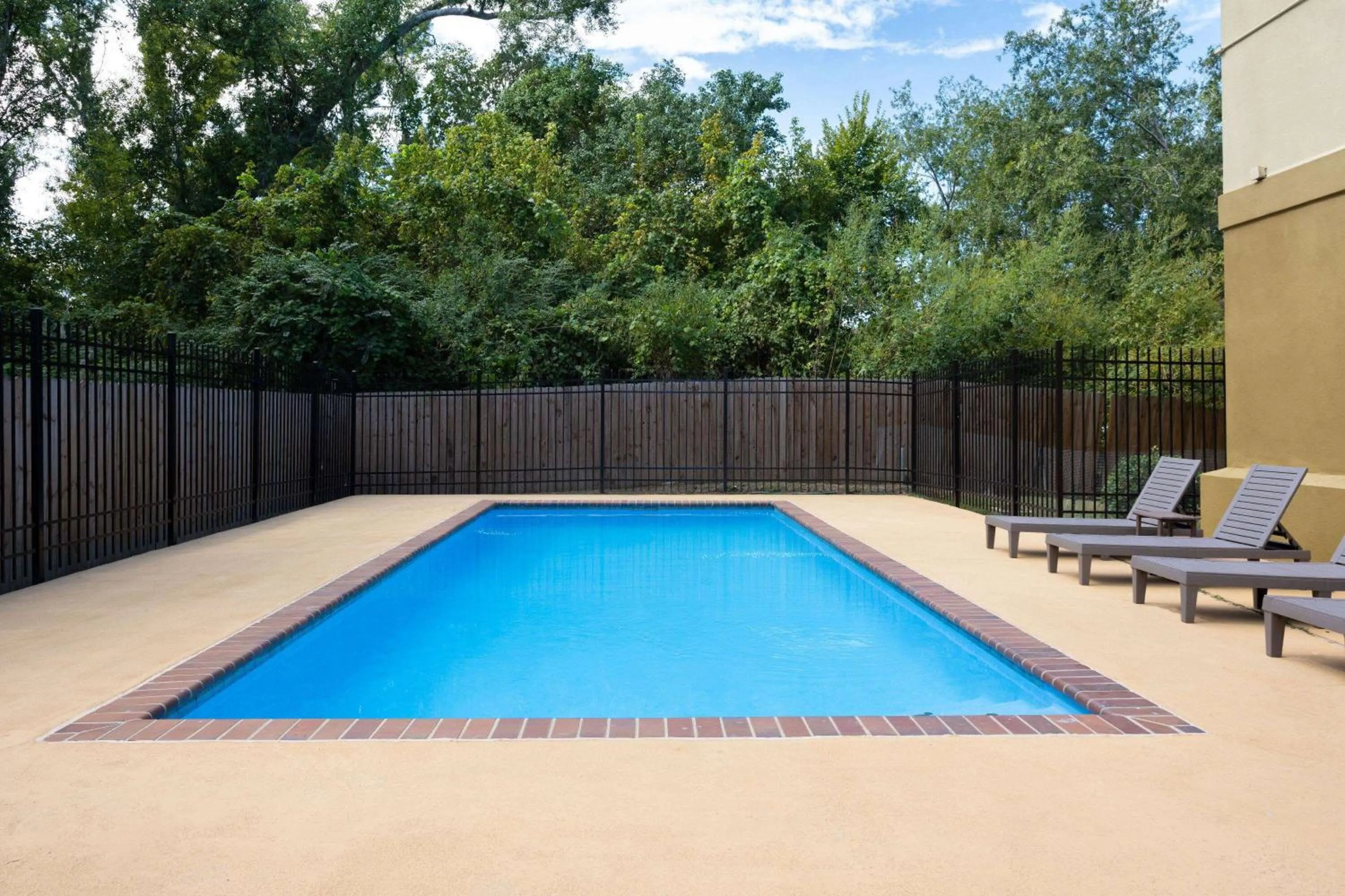 Pool view in Microtel Inn & Suites by Wyndham of Houma