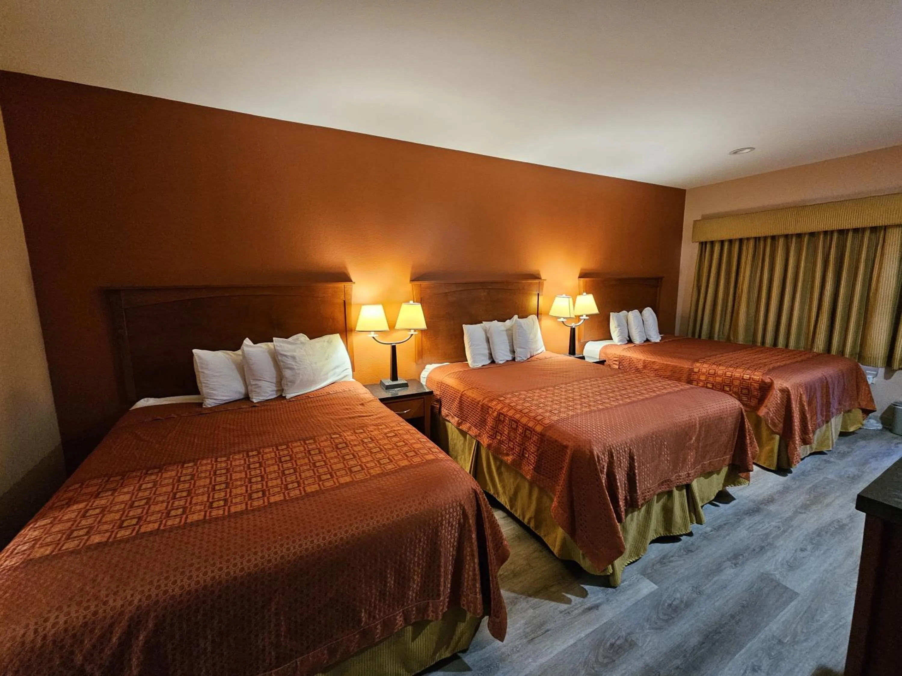 Bed in Budgetel Inn and Suites