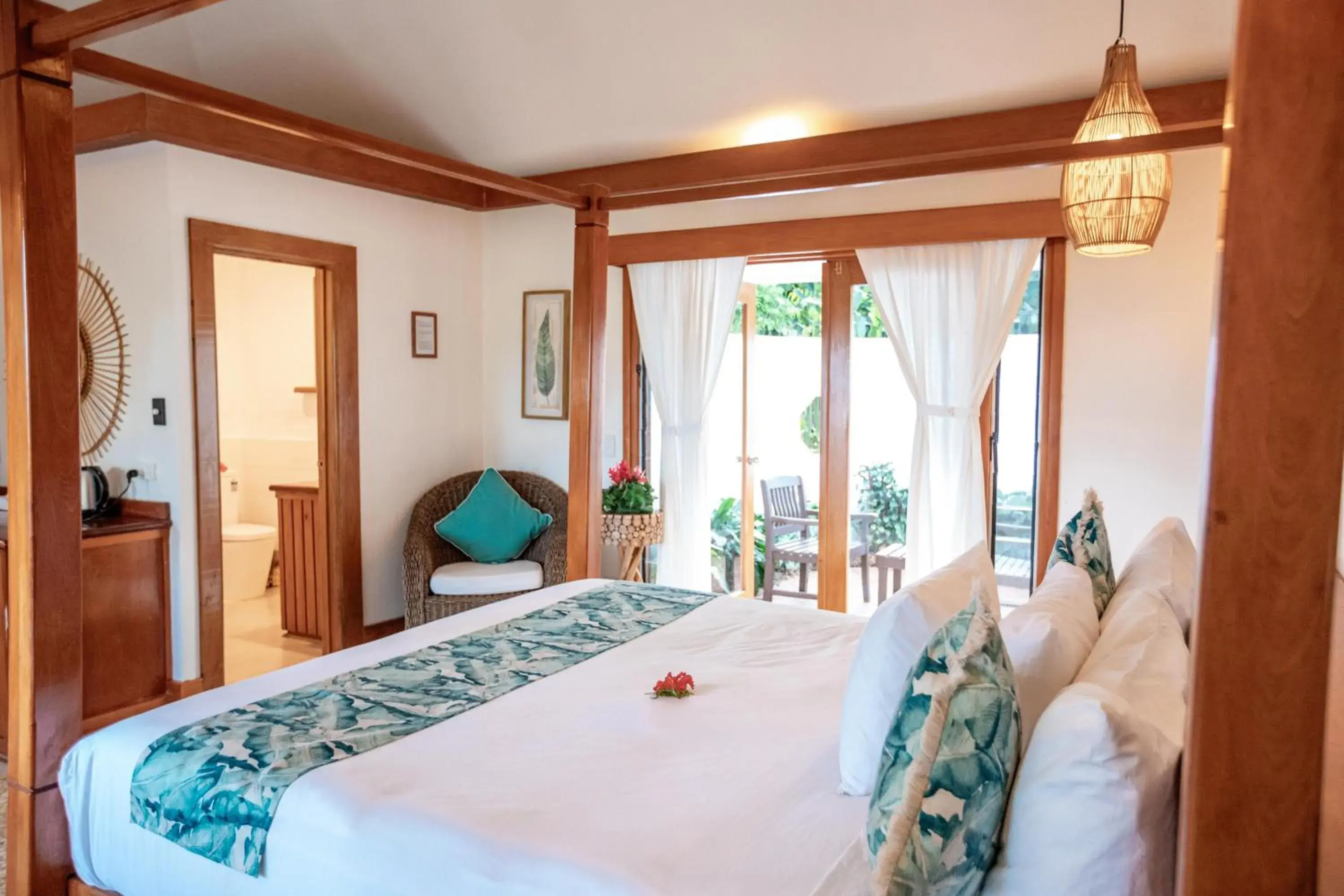 Bed in Koro Sun Resort & Rainforest Spa Bed in Koro Sun Resort & Rainforest Spa