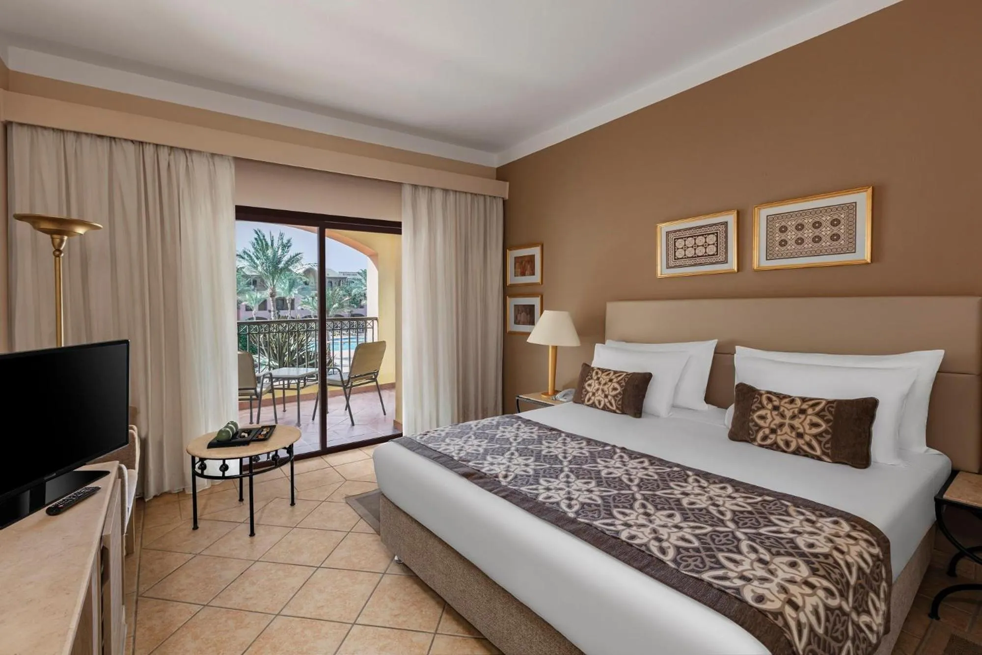 Photo of the whole room, Bed in JAZ Makadi Saraya Resort