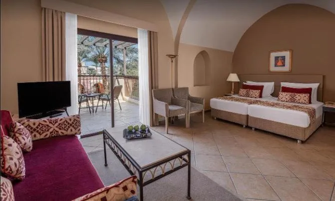 Photo of the whole room, Bed in JAZ Makadi Saraya Resort