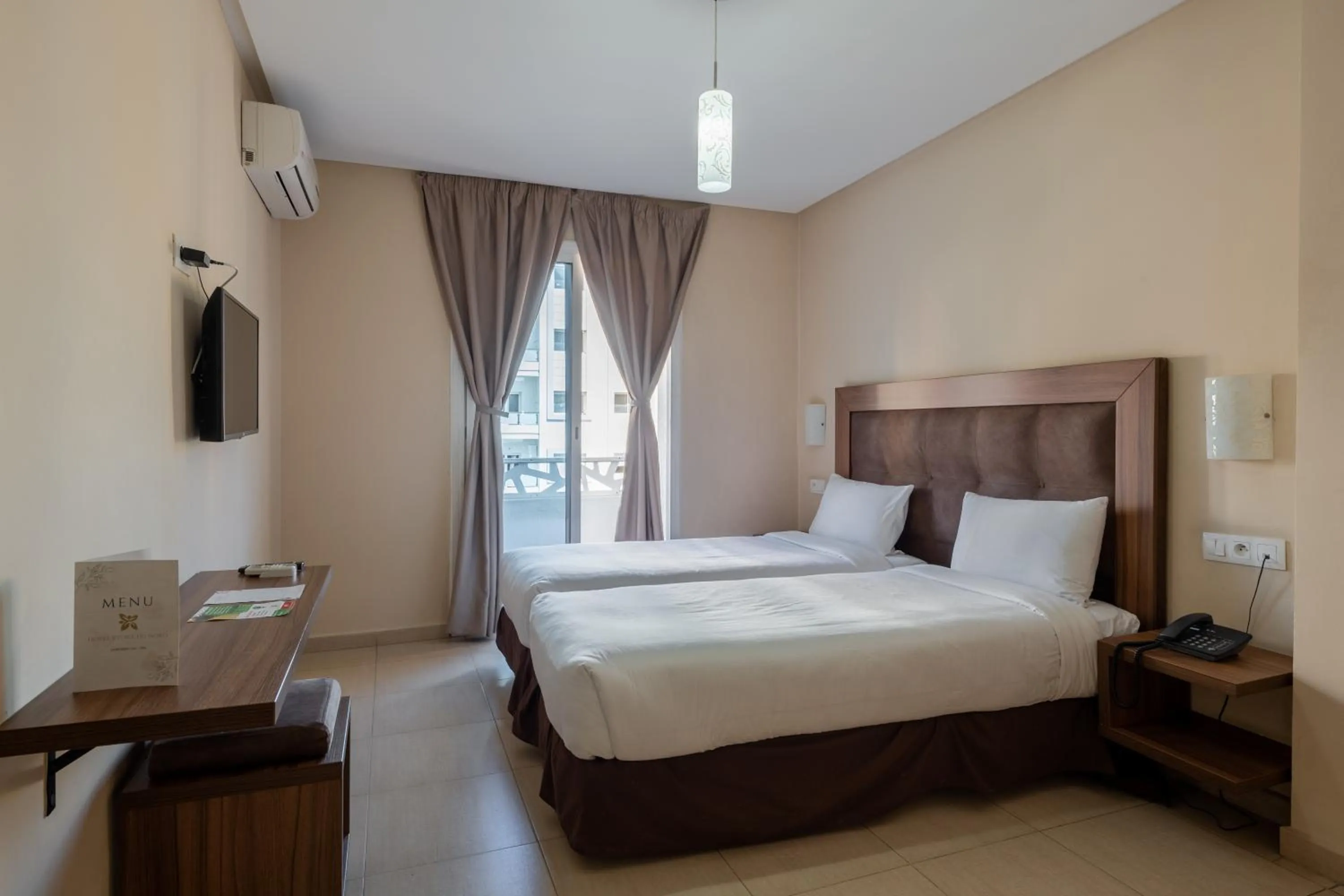 Bed in Hotel Etoile Du Nord