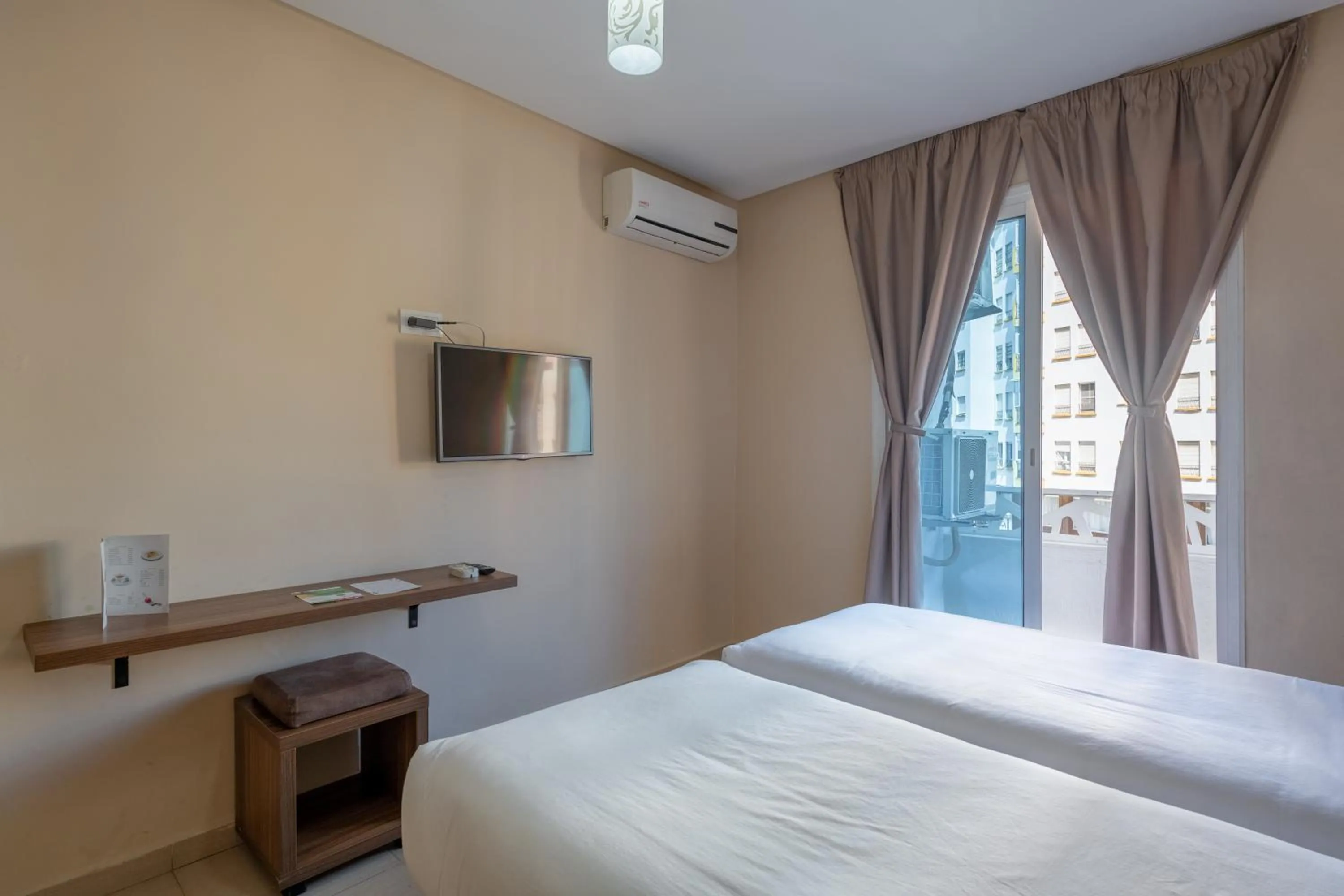 Bed in Hotel Etoile Du Nord