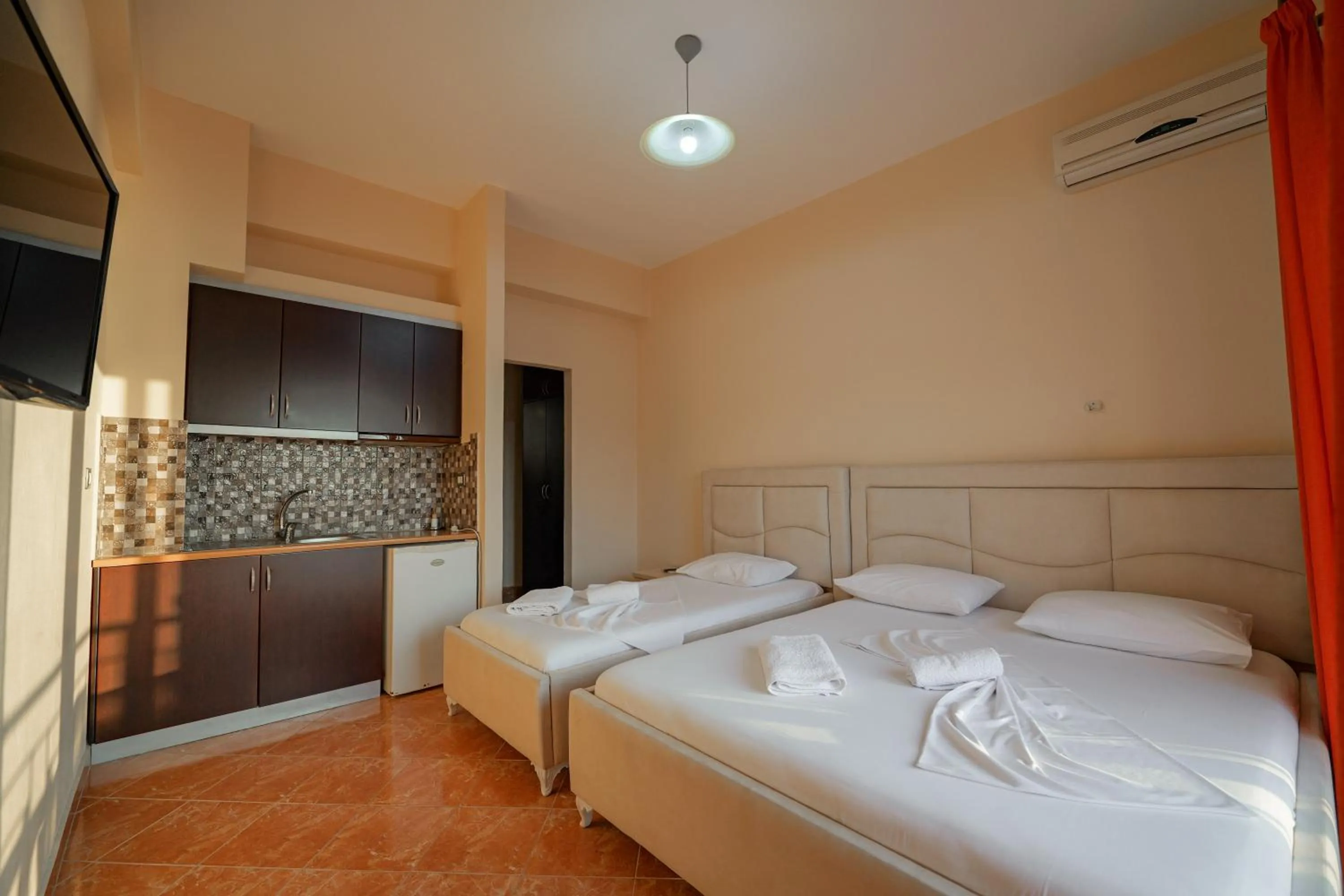 Bed in Unico ApartHotel