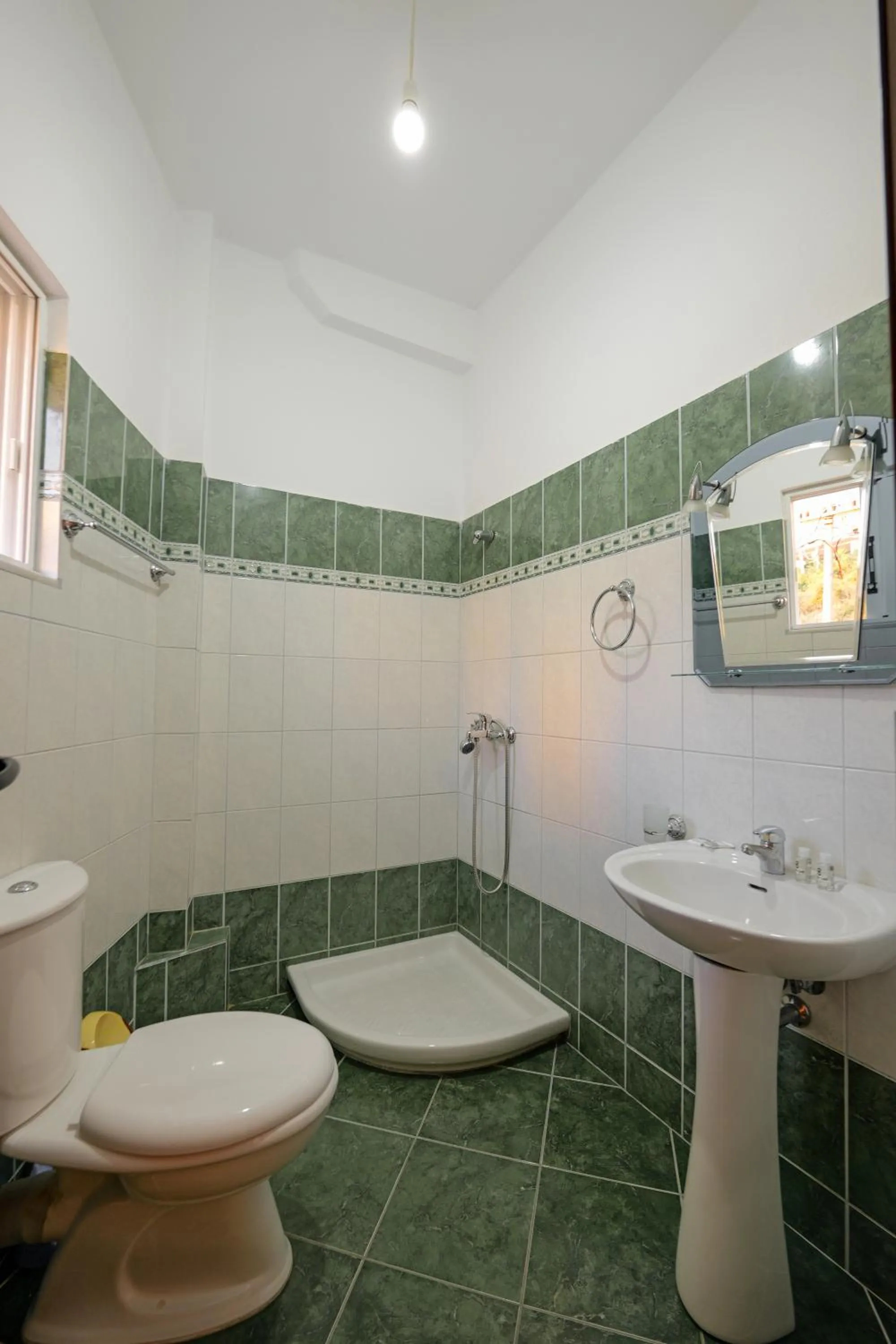 Bathroom in Unico ApartHotel