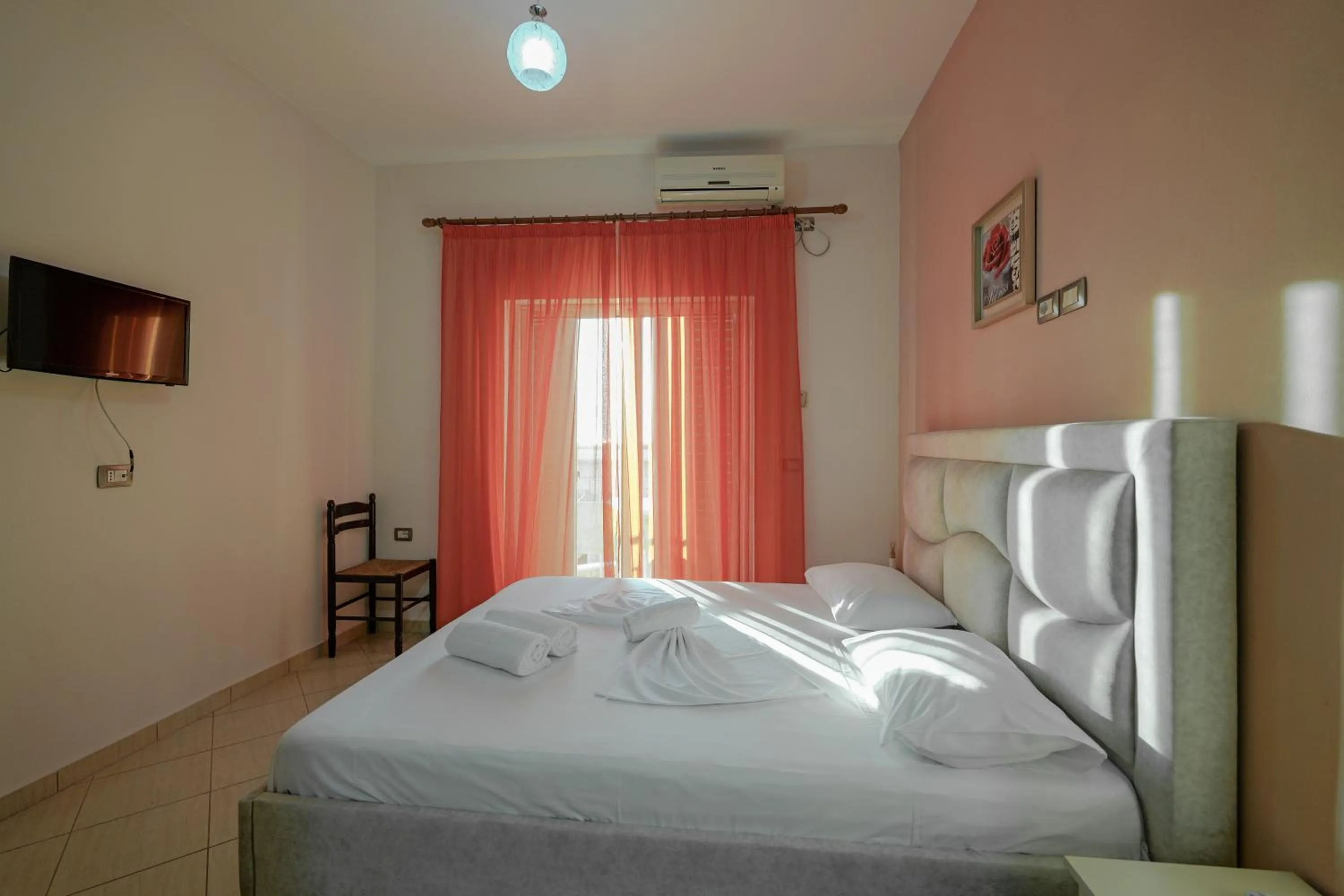 Bed in Unico ApartHotel