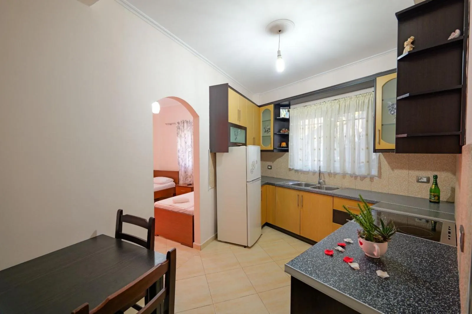 Kitchen or kitchenette in Unico ApartHotel