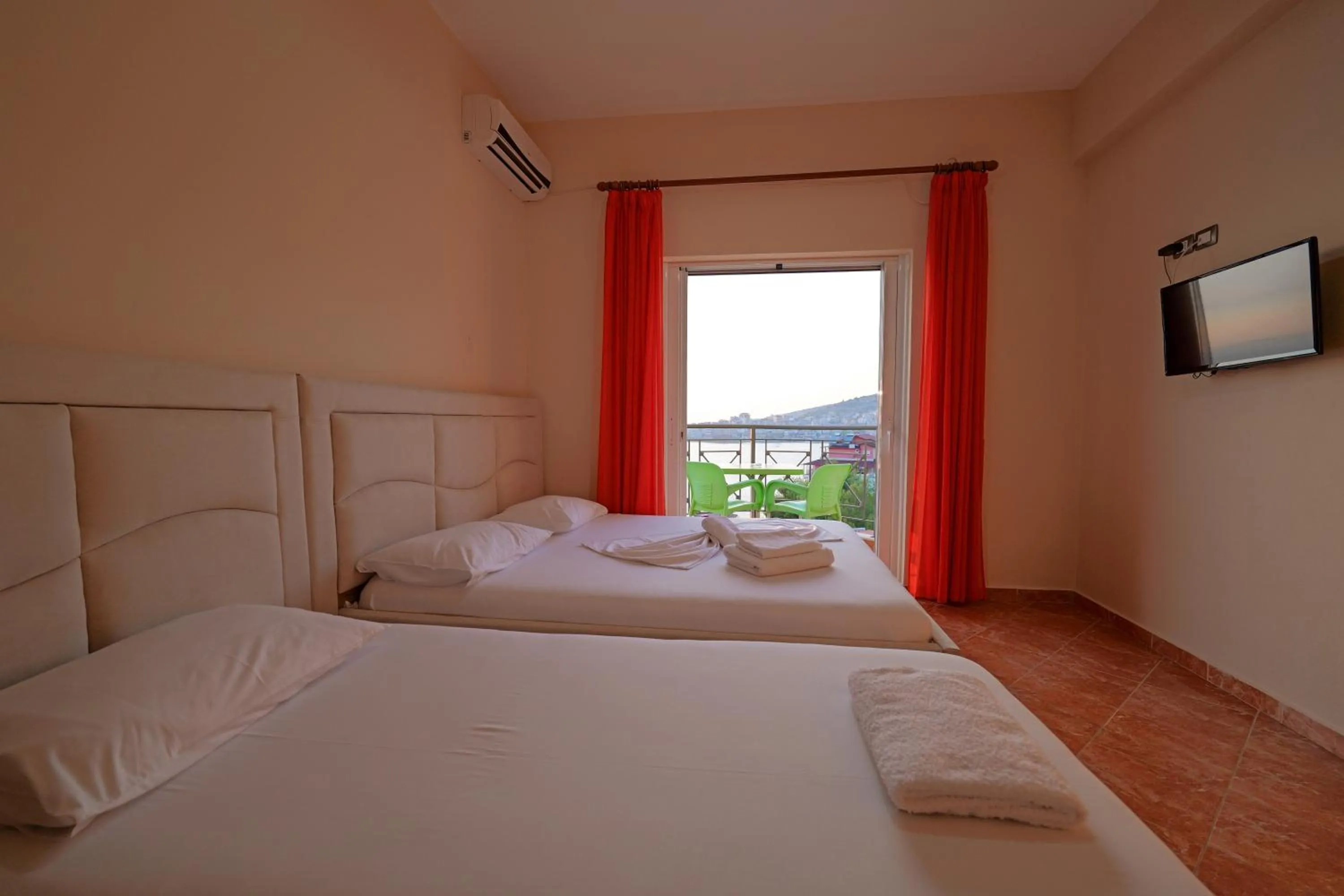 Bed in Unico ApartHotel