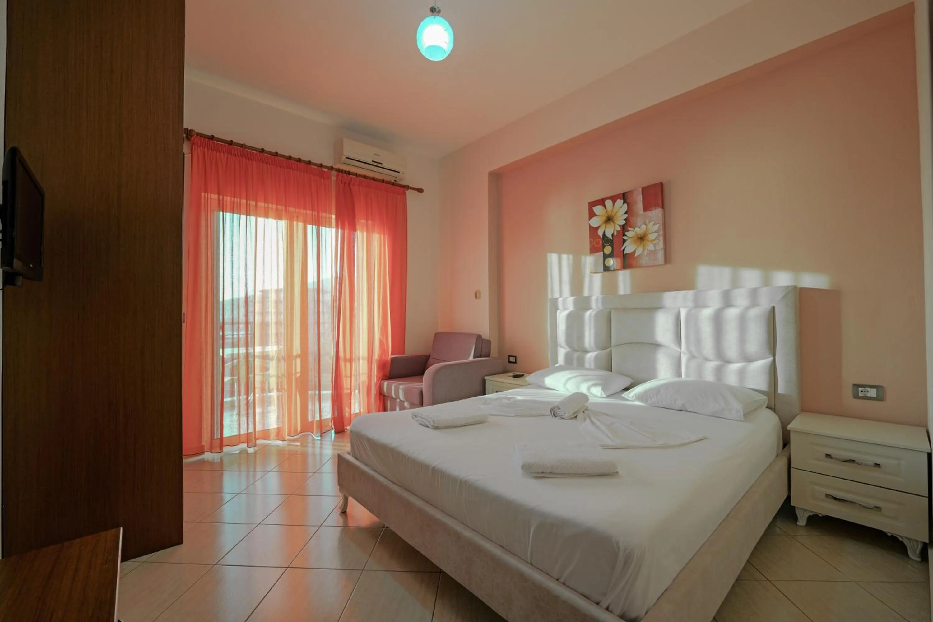 Bed in Unico ApartHotel