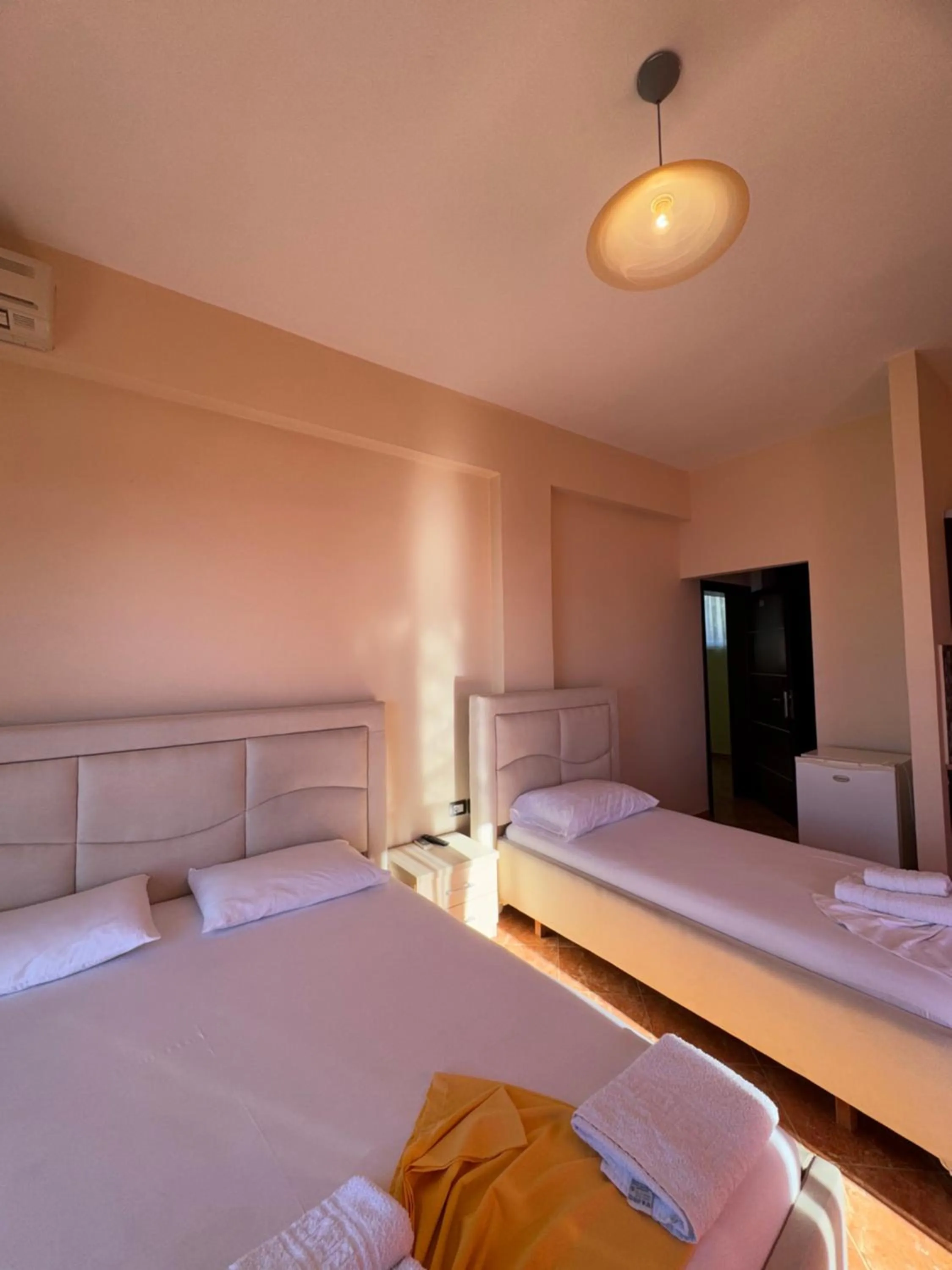 Bed in Unico ApartHotel