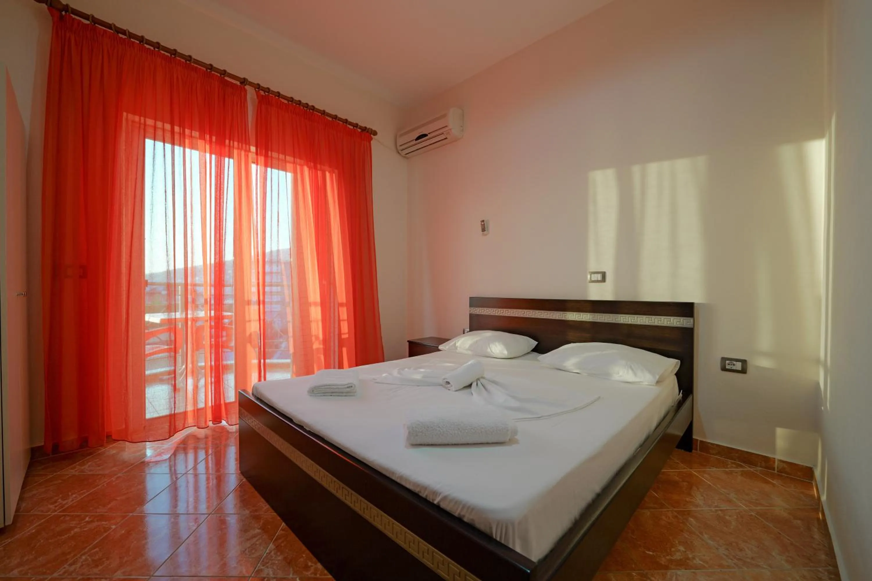 Bed in Unico ApartHotel