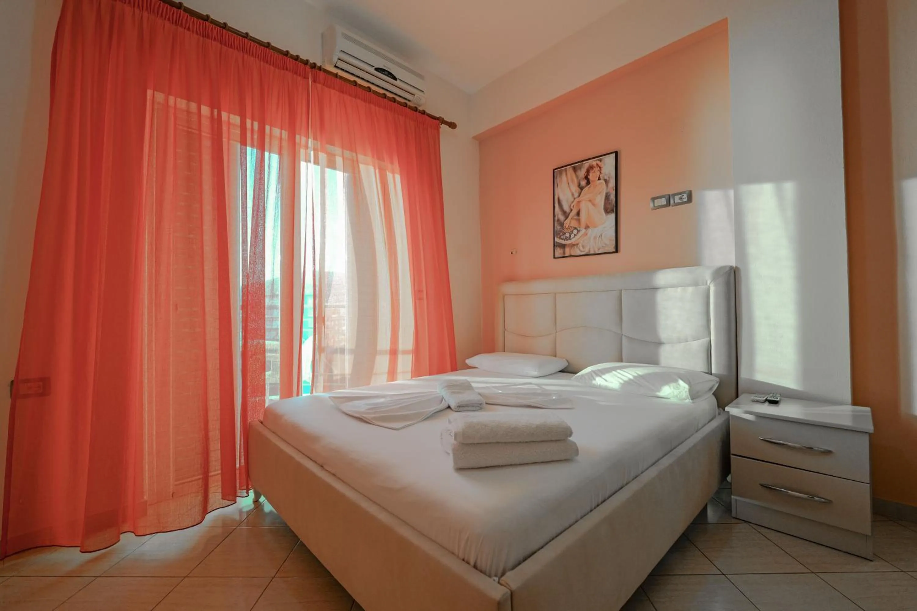 Bed in Unico ApartHotel