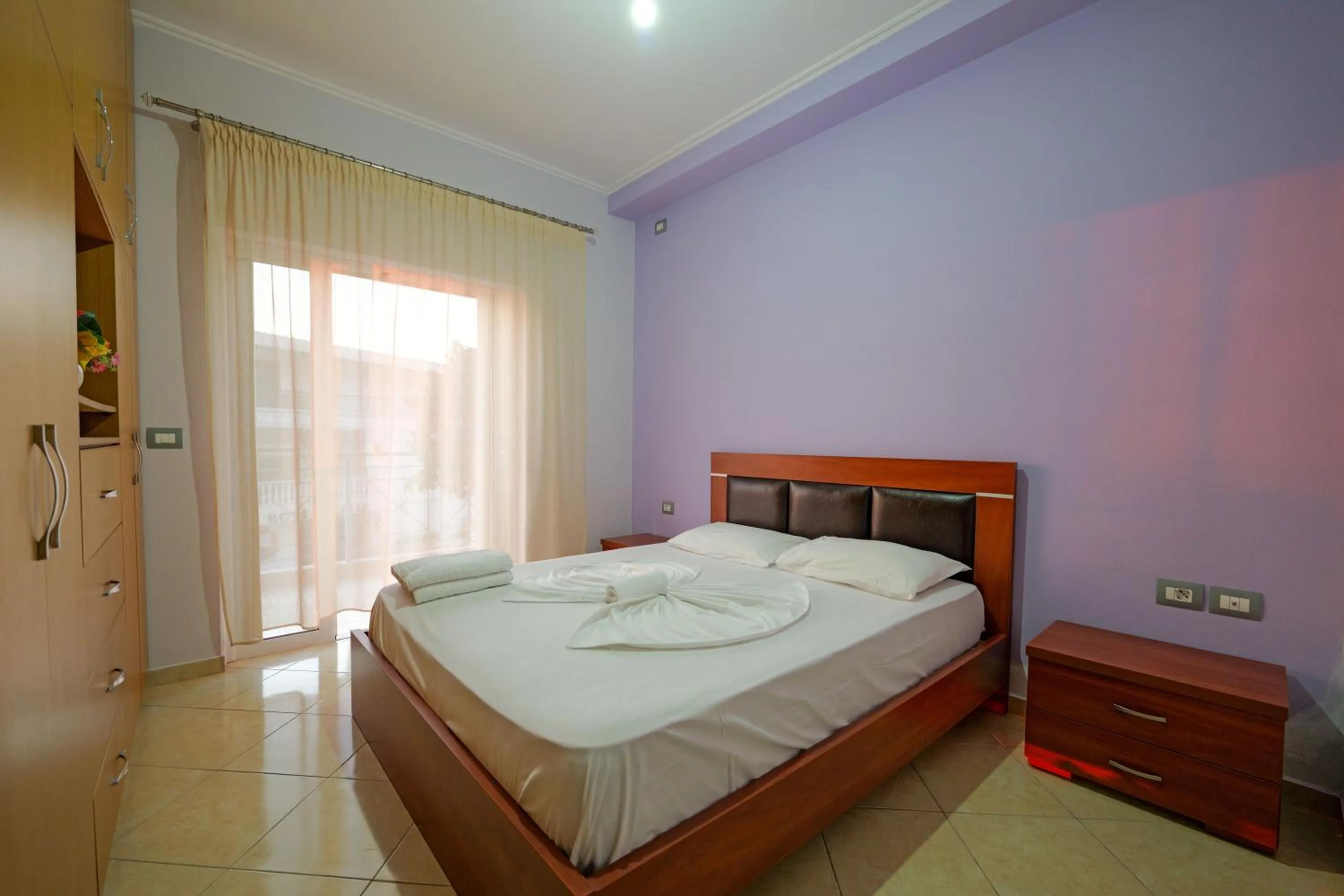 Bed in Unico ApartHotel