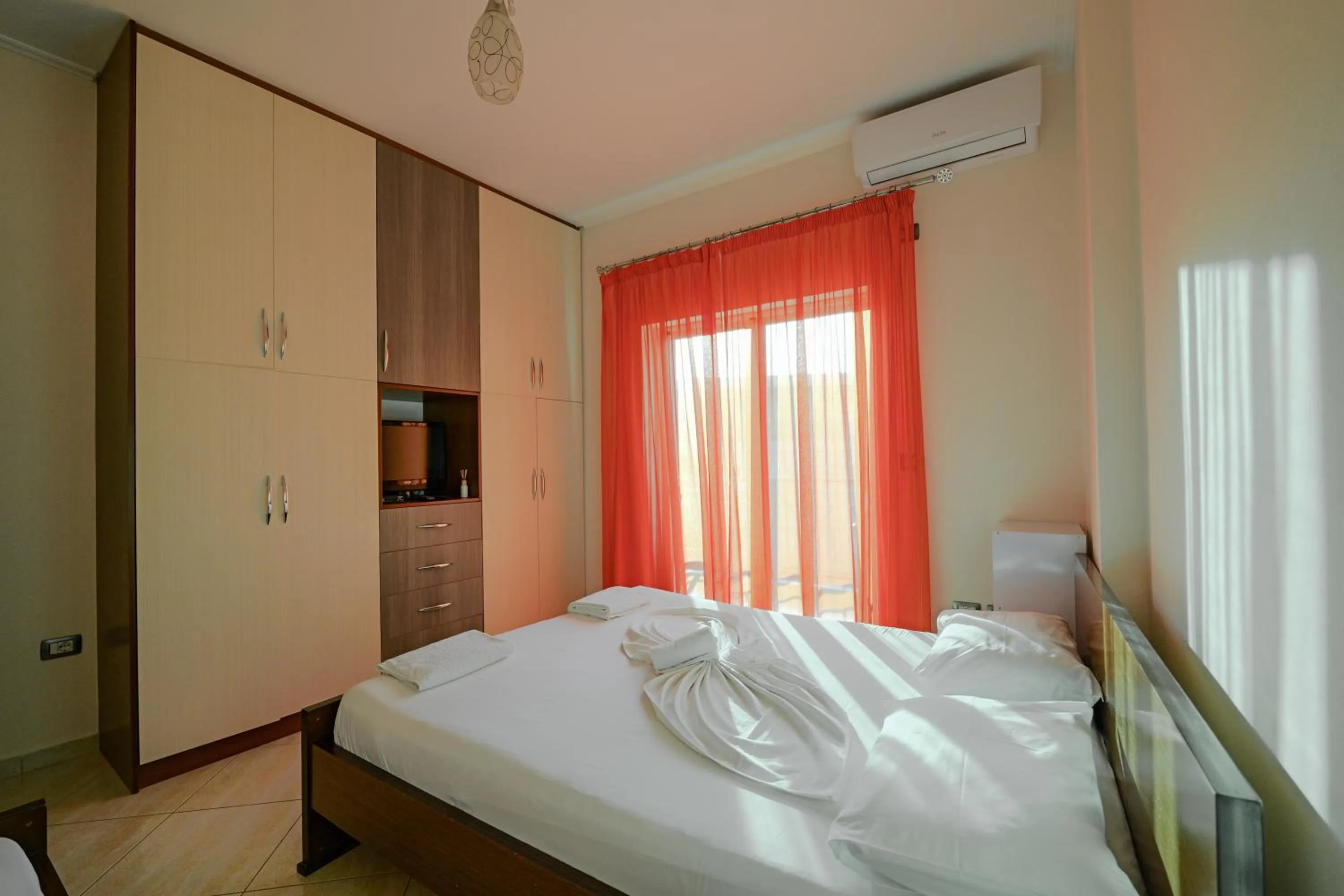 Bed in Unico ApartHotel