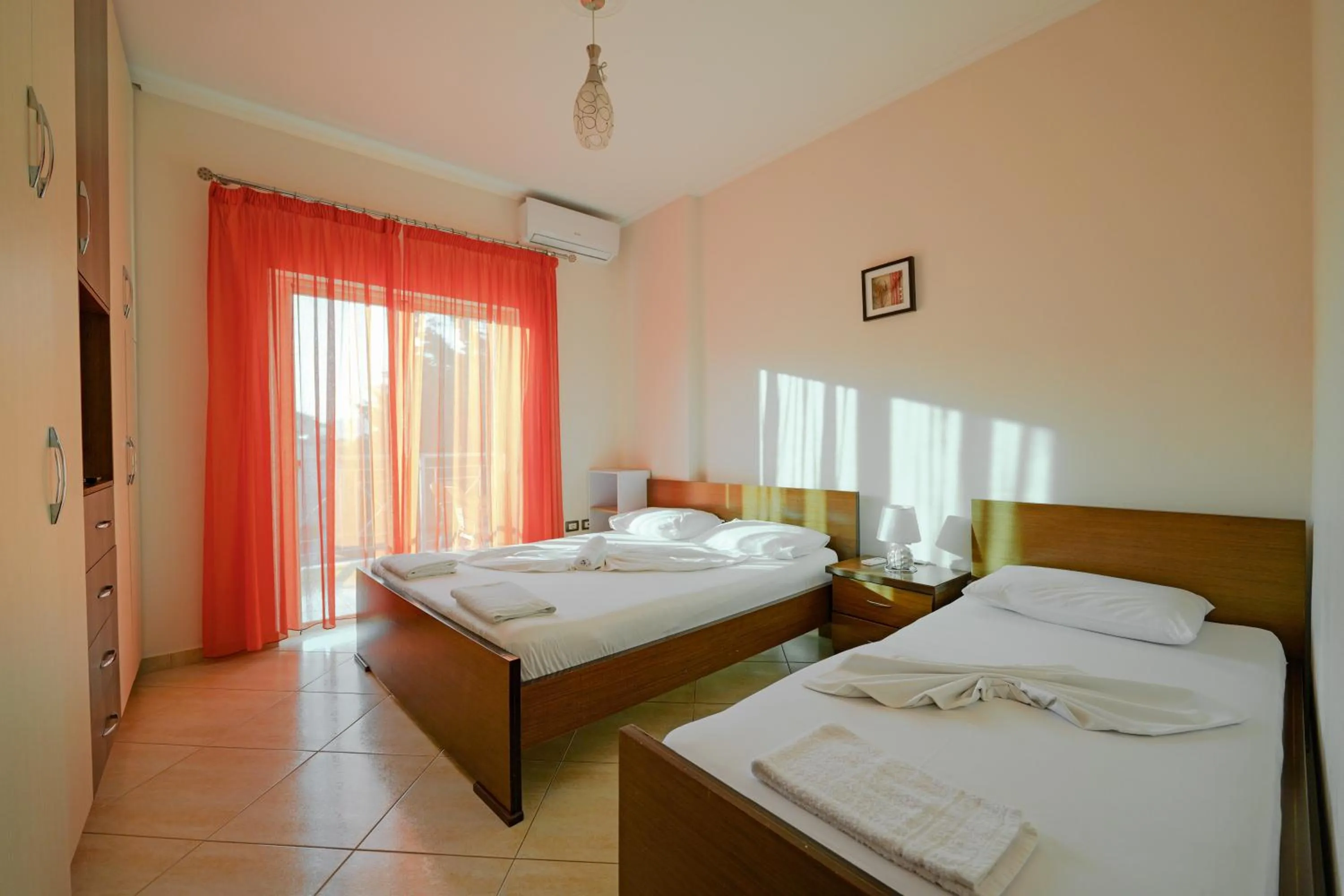 Bed in Unico ApartHotel